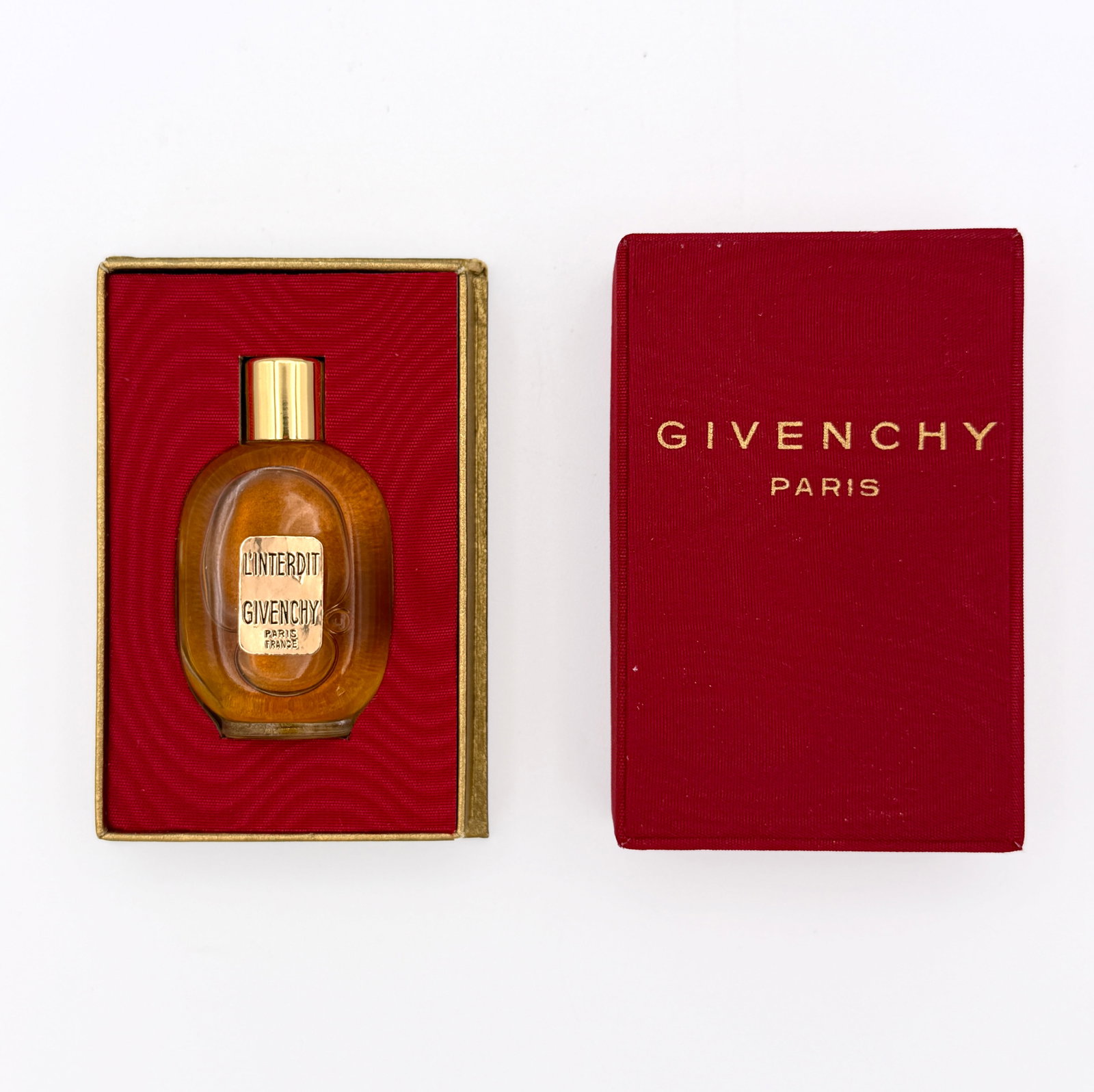 Vintage Givenchy L'Interdit 1/4 oz Perfume: Vintage Givenchy L’Interdit Vintage Mini Perfume 1/4 oz. Full bottle, unopened housed in red box.