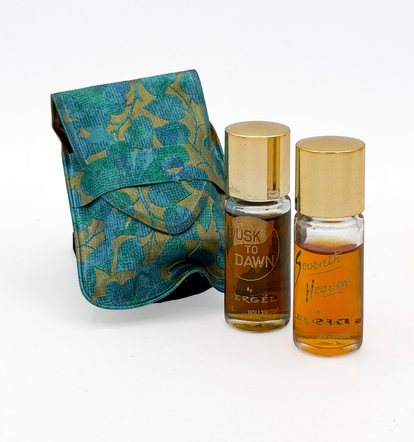 RARE Seventh Heaven/Dusk to Dawn mini perfume set: RARE Vintage 1945 Seventh Heaven & 1953 Dusk to Dawn mini perfume bottle set in a teal & gold pocket case by Bergel of Hollywood. 1.5 drams each mini bottle, each set comes with 1 Seventh Heaven and 1