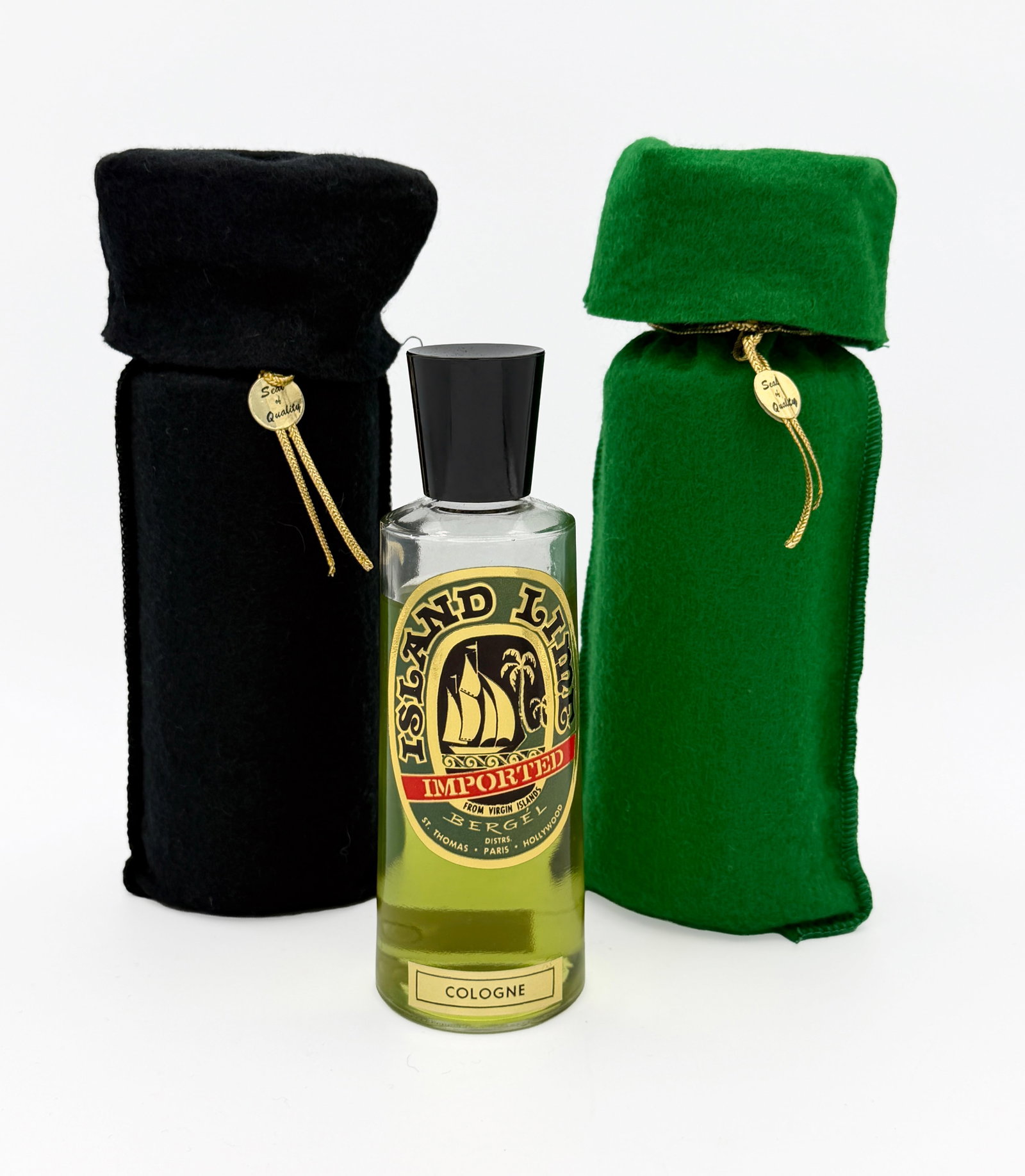Vintage "Island Lime" Cologne/Aftershave set 8oz: Lot of 3 Vintage "Island Lime" Cologne/Aftershave set in fabric gift bags by Bergel of Hollywood - 8 fl oz. Unused (After Shave only). Please Note: 8 oz. Cologne bottle has trace amounts of contents r