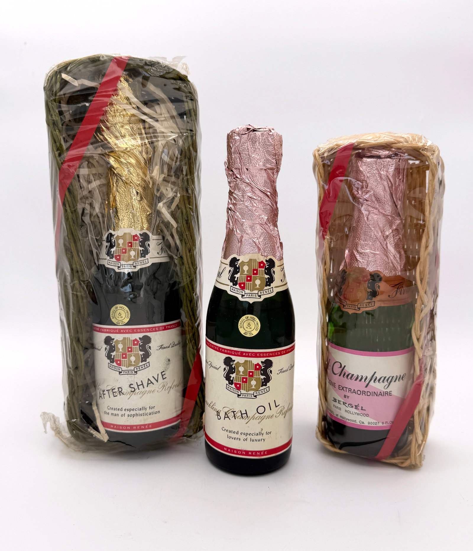Vintage Pink Champagne Shaped Gift Lot of 3: Lot of 3 Vintage Pink Champagne gift set by Bergel of Hollywood in wrapped gift baskets - Cologne, After Shave, Bath Oil - 6 fl oz each - All New in Box Unused.