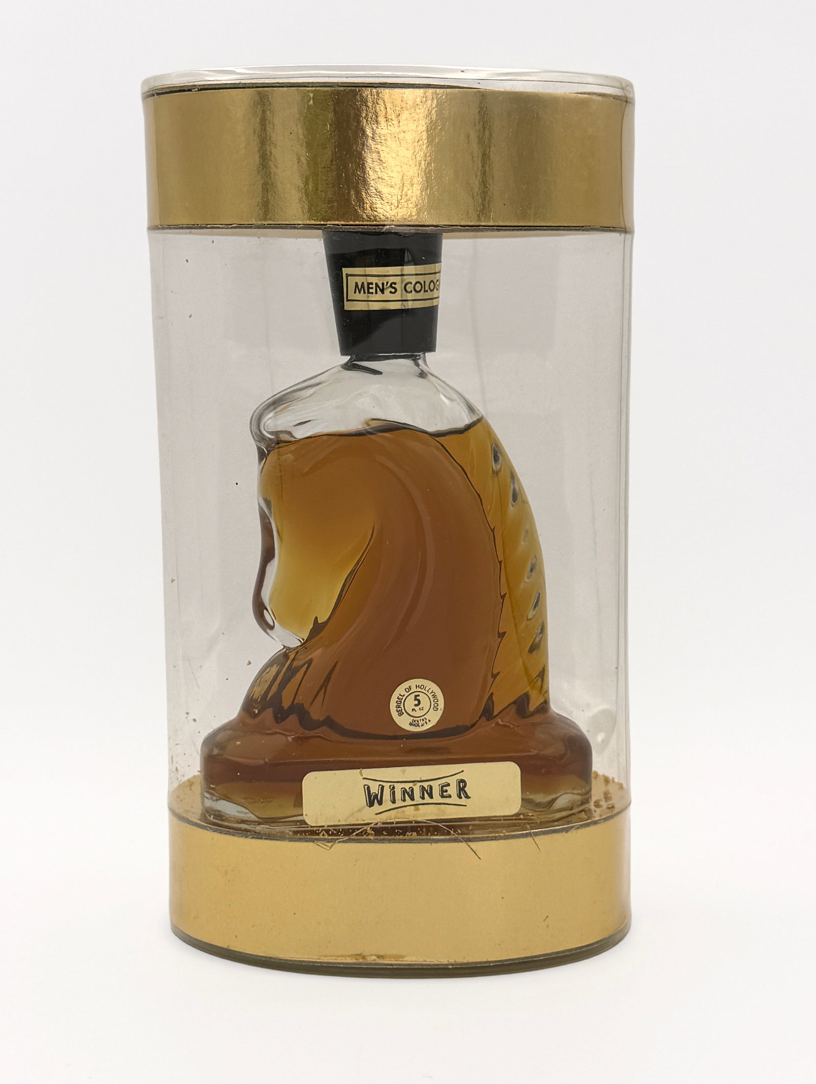RARE Vtg Winner Men's Cologne in horse bottle: Vintage Winner Men's Cologne by Bergel of Hollywood - 5 fl oz in horse shaped glass bottle. Bergel of Hollywood, a luxury perfume business established in 1945 specializing in popular fragrances and