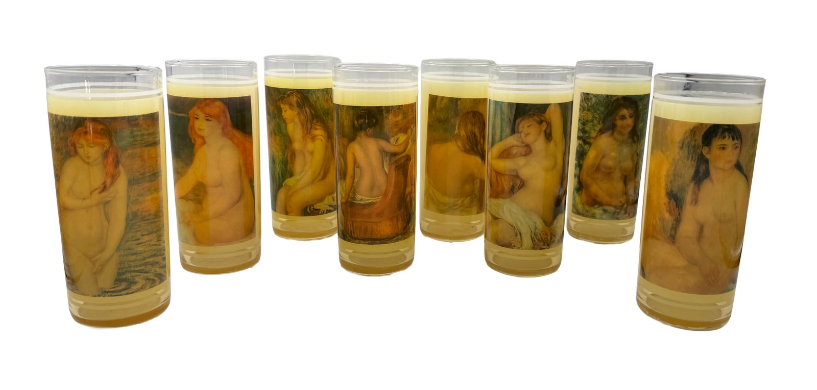 Vintage Set of Renoir nudes Highball Glasses: Complete vintage set of 8 12oz Highball style glasses with paintings by Pierre-Auguste Renoir (1841-1919), with a thin non-slip rubberized coating surrounding the entire glass (other than the top 1/2"