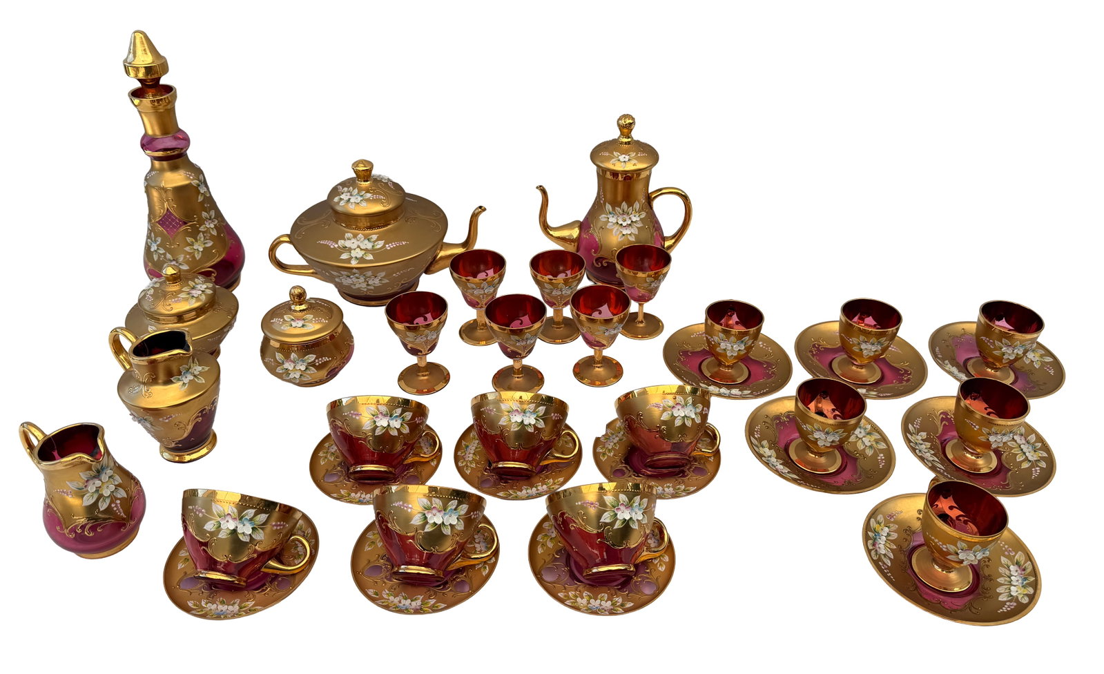 Vintage Czech rose glass gilded tea 37pcs set: Offered is a vintage Bohemian (Czech) ruby glass coffee/tea service, featuring cranberry glass with heavy gold gilt overlay and hand-painted raised enamel florals. This is a complete set, representati