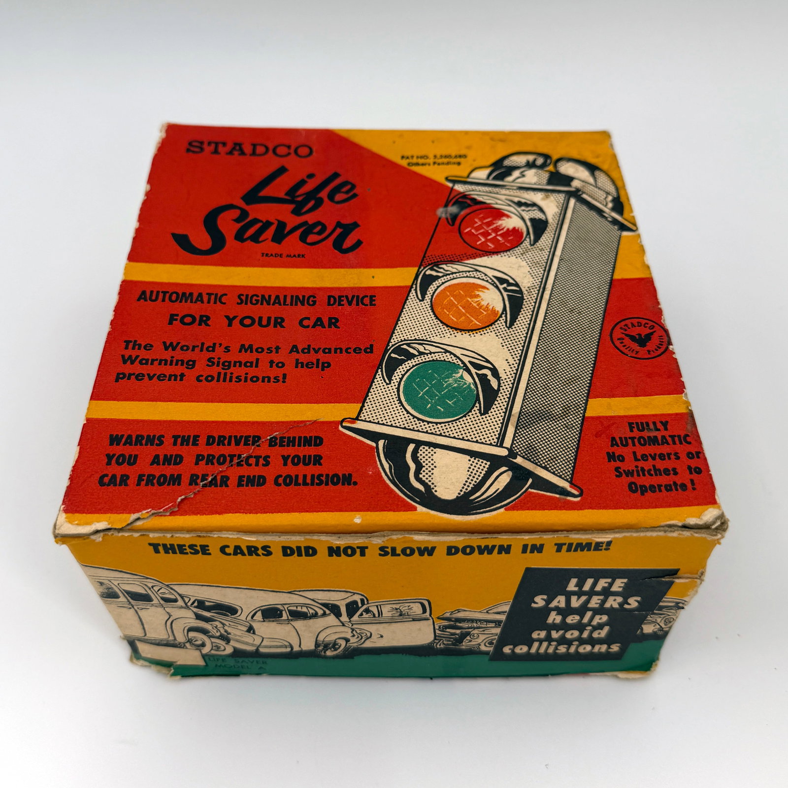 Stadco Lifesaver Stop Light Automobile Accessory: Vintage Stadco Life Saver traffic light signal in original box. Never used, great shape, comes with installation instructions and unopened hardware packet in a fair original box that has tape repairs.
