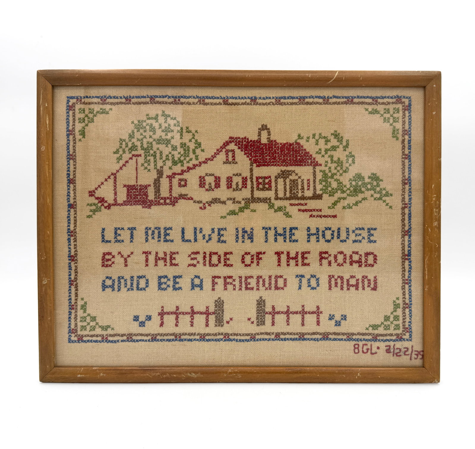 1935 Framed American Needlepoint: 1935 Traditional American Needlepoint. "Let me live in the house by the side of the road and be a friend to man" in an old simple brown frame.