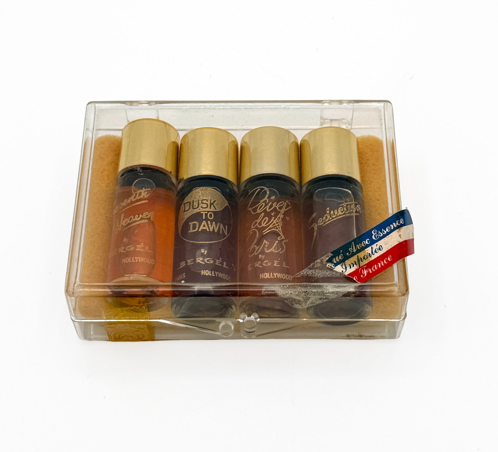 Vintage Rare set of 4 Mini perfumes: Vintage MCM Mini travel perfume bottle set of 4 - Seventh Heaven, Dusk to Dawn, Reve de Paris, & Seduction by Bergel of Hollywood (1.5 drams each bottle).