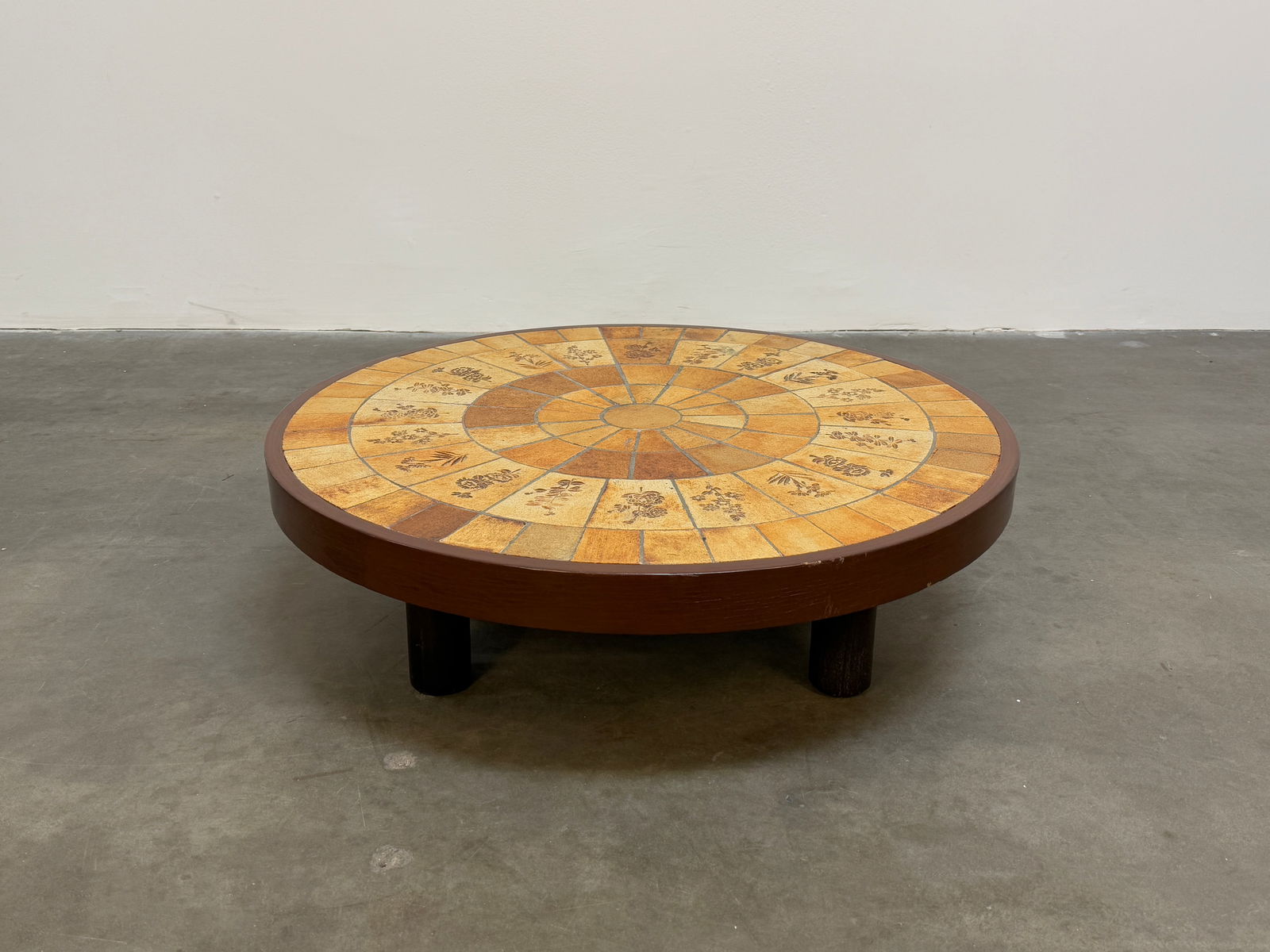 Roger Capron Garrigue Coffee Table: Roger Capron coffee table featuring Garrigue tiles, a technique in which real leaves from la garrigue, a variety of vegetation indigenous to southeastern France only, are pressed into the clay and, du