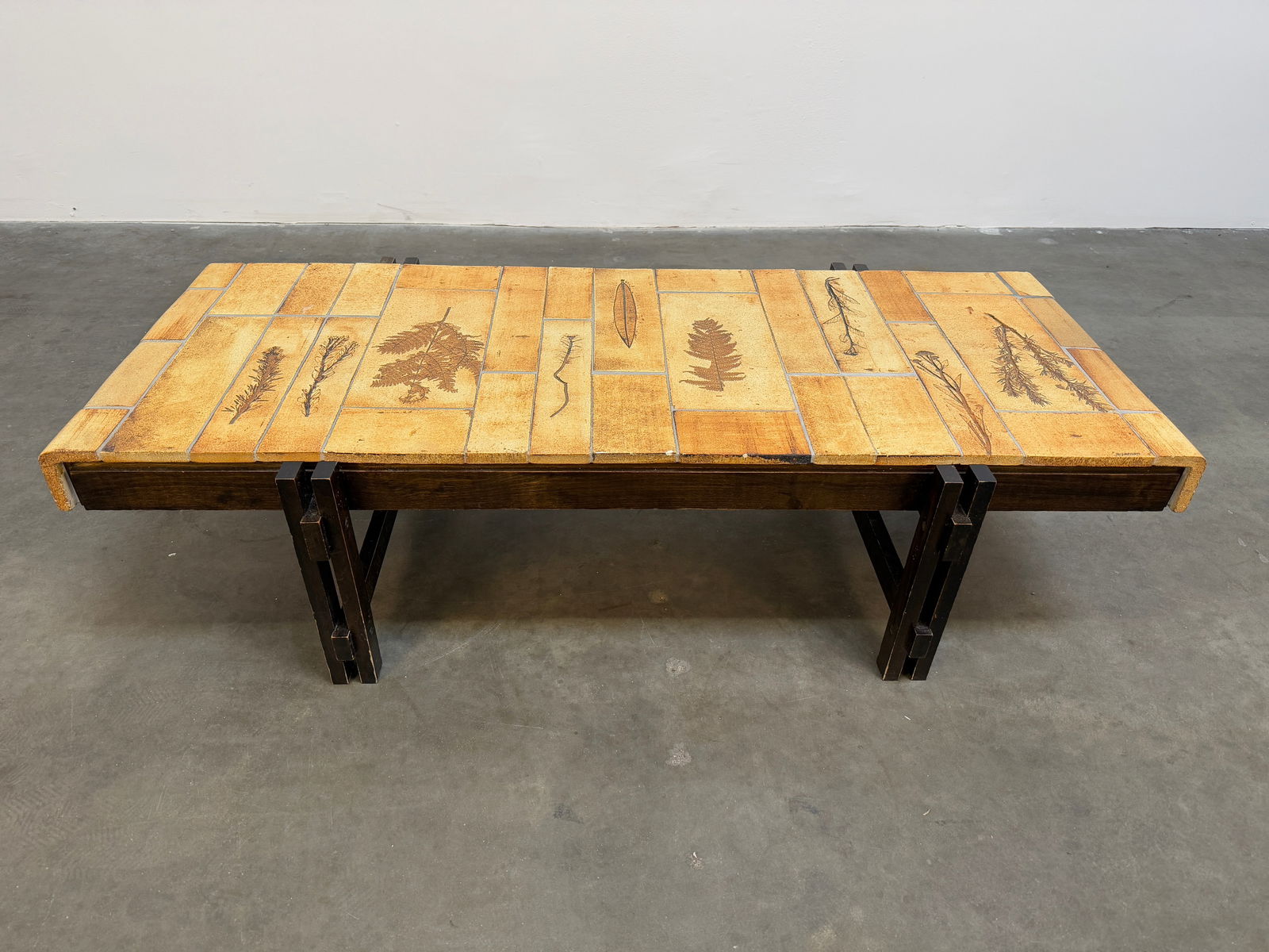 Large Roger Capron Coffee Table with Garrigue Tiles: Roger Capron coffee table signed featuring Garrigue tiles, a technique in which real leaves from la garrigue, a variety of vegetation indigenous to southeastern France only, are pressed into the clay