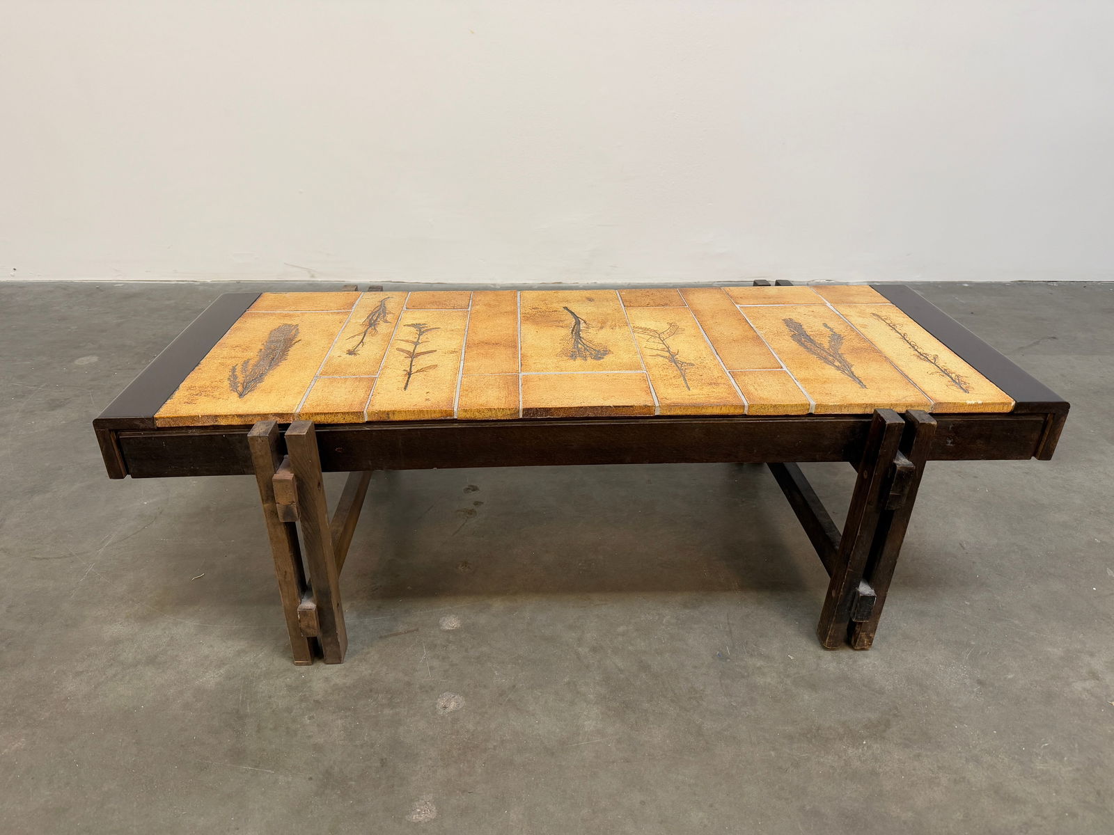 Coffee Table with Garrigue Tiles on Wood Frame by Roger Capron: Roger Capron oak and ceramic coffee table featuring Garrigue tiles, a technique in which real leaves from la garrigue, a variety of vegetation indigenous to southeastern France only, are pressed into