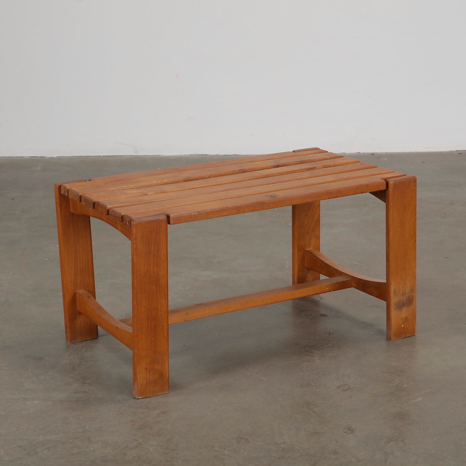 Brutalist Wood Coffee Table, 1970s: Hand carved Brutalist coffee table with bold geometric lines. Brutal elegance in solid wood. Height: 16 in. Width: 30 in. Depth: 16.5 in.