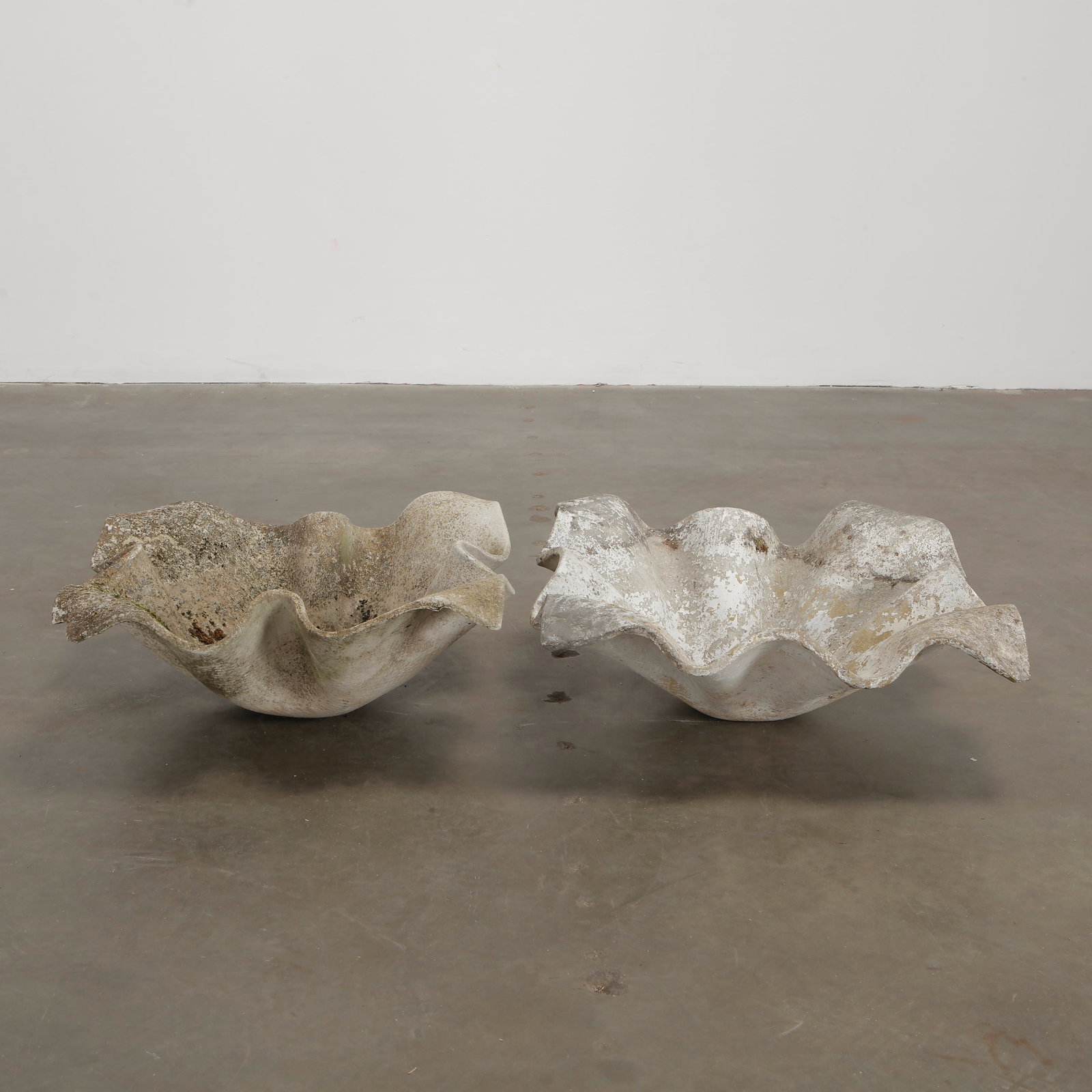 Pair of Small Willy Guhl Elefantenohr Elephant Ear Planters, Switzerland, circa 1960: Pair of Small Elefantenohr Elephant Ear planters, also known as handkerchief planters, by Willy Guhl for Eternit, Switzerland circa 1960. Factory-drilled drainage holes. Wonderful patina. Height: 8 in