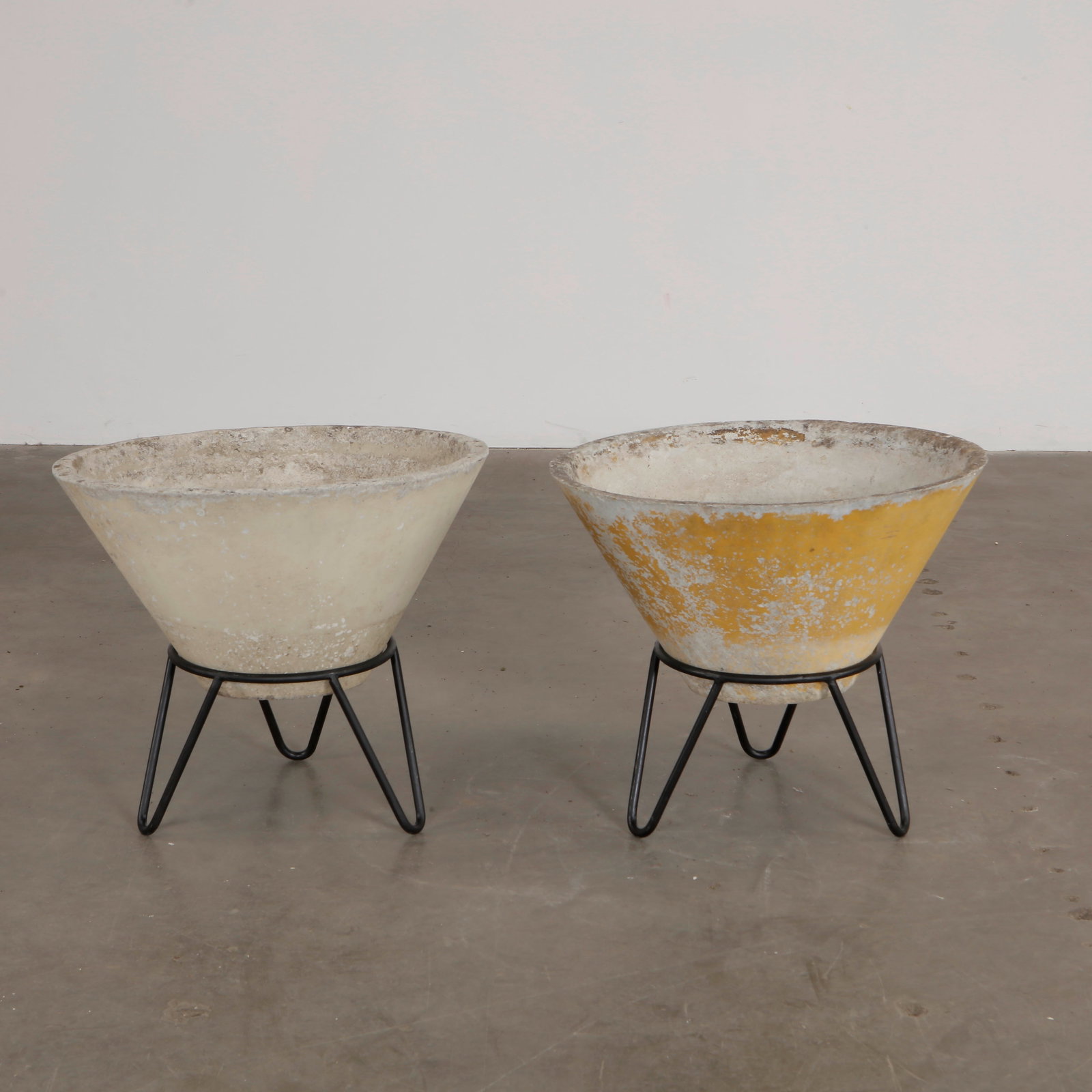Pair of Medium Willy Guhl Conical Planters with Stands, 1960s: Elegant conical planters by Willy Guhl, mid-sized and elevated on metal stands. A refined balance of form and function. Height: 19 in. Diameter: 22 in