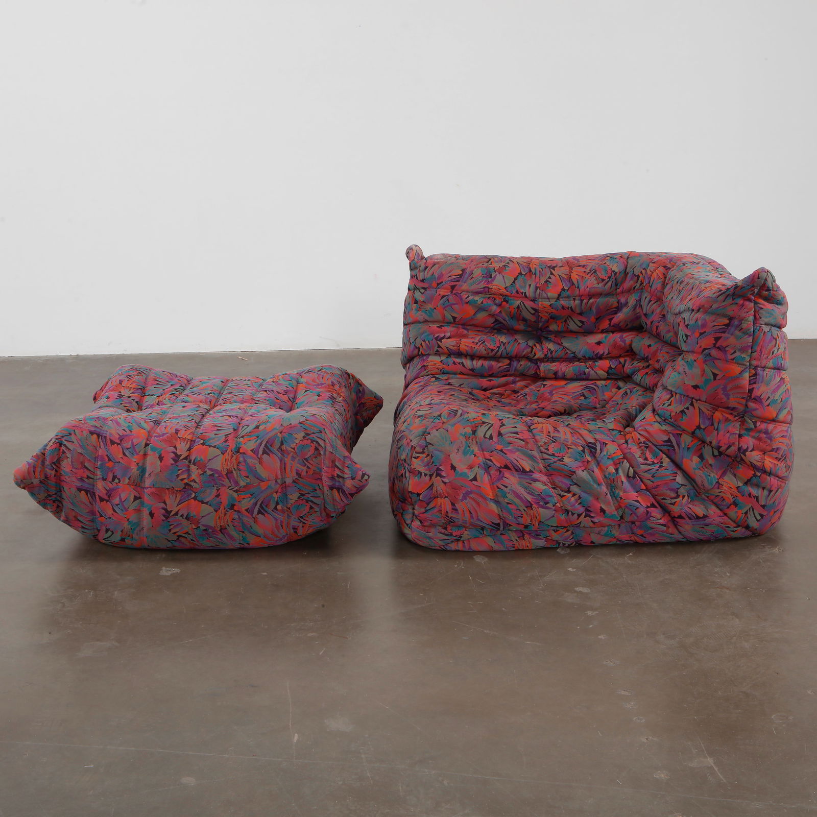 Togo Multicolor Armchair with Ottoman for Ligne Roset, 2001: Iconic Togo Multicolor with floral print. Height: 27 in. Width: 52 in. Depth: 38 in. Ottoman Height: 15 in. Width: 34 in. Depth: 34 in.