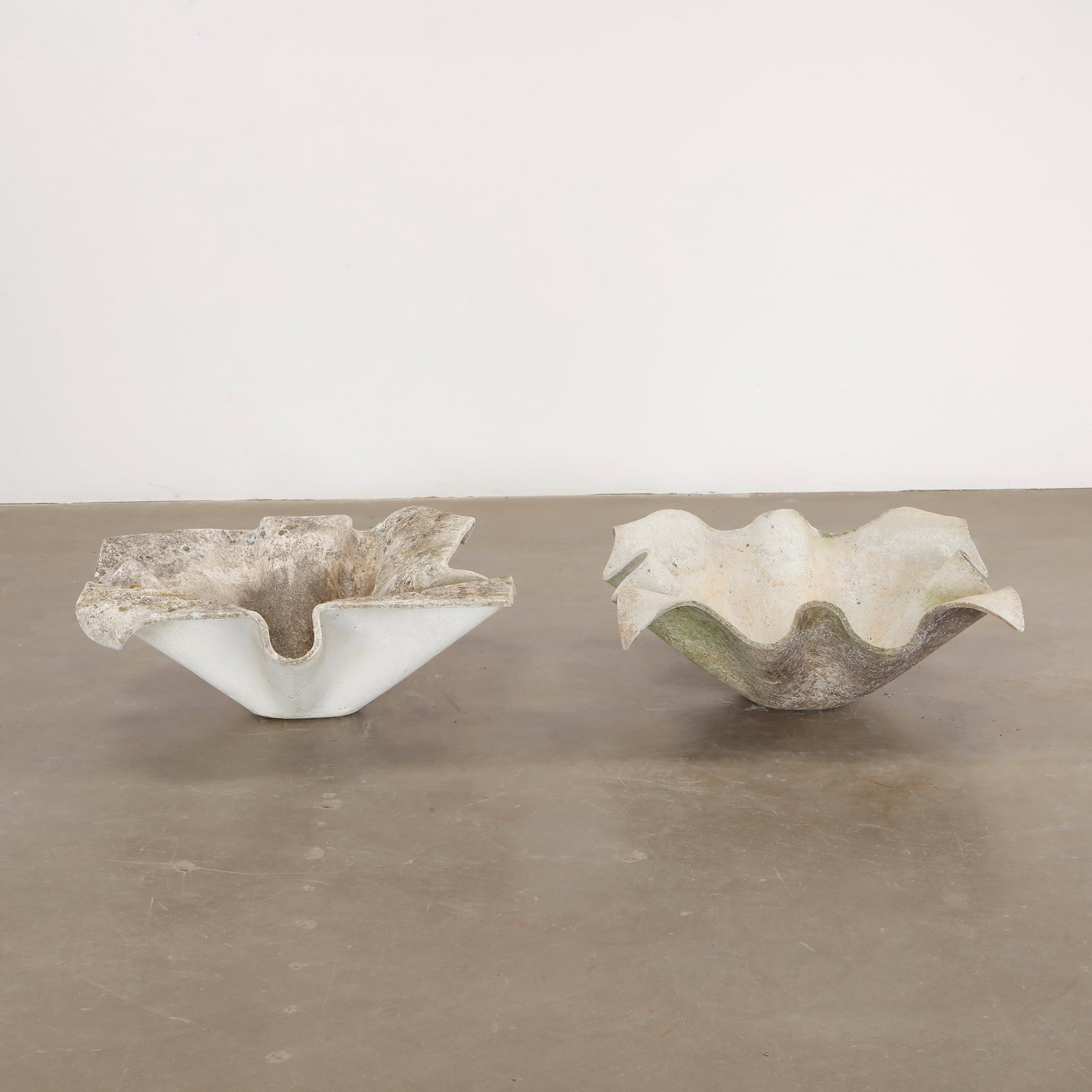 Pair of Large Willy Guhl Elephant Ears Planters, 1960s: Pair of Large Elephant Ear planters, also known as handkerchief planters, by Willy Guhl for Eternit, Switzerland circa 1960. Factory-drilled drainage holes. Wonderful patina. Width: 35 in. Length: 35 