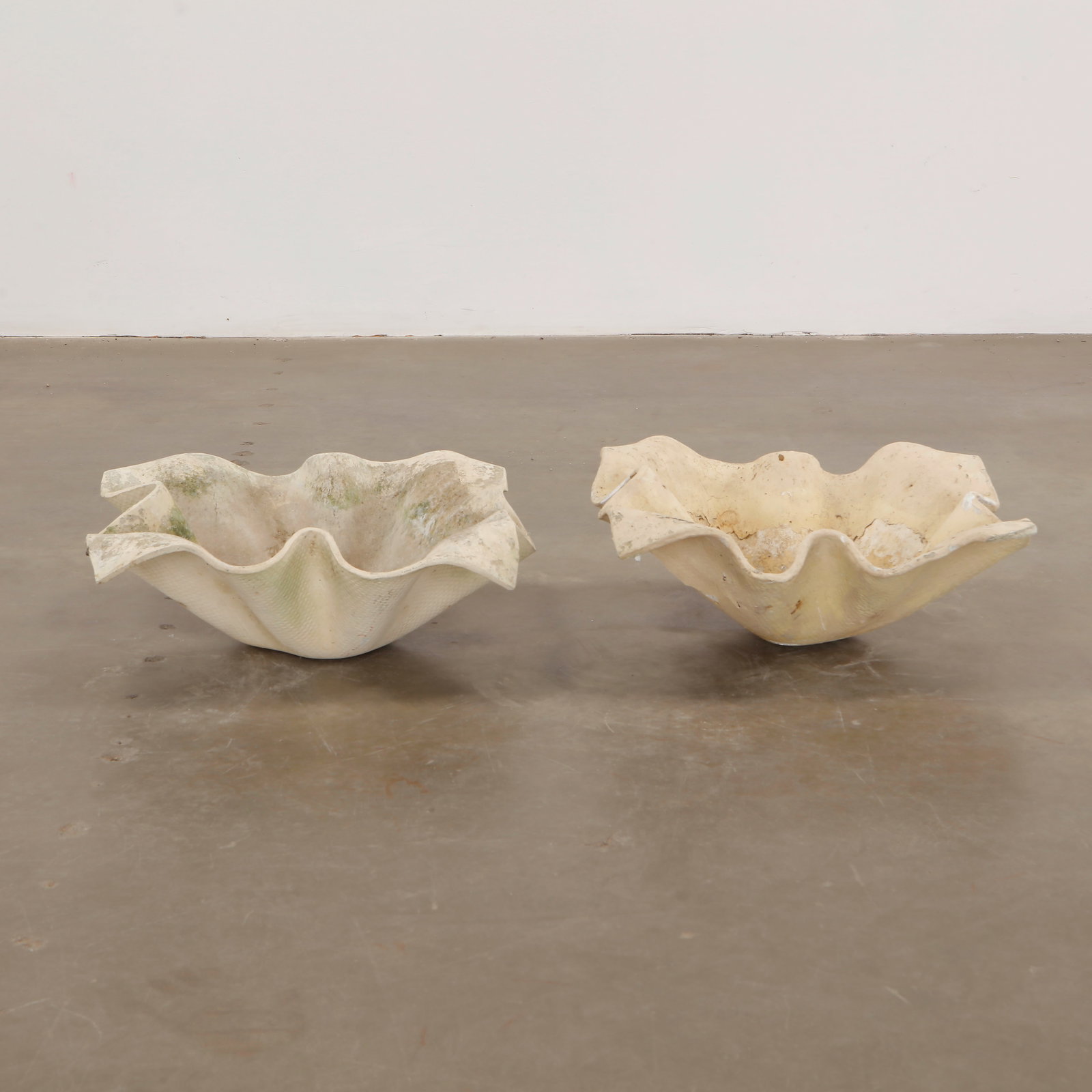 Pair of Small Willy Guhl Elephant Ears Planters, 1960s: Pair of small Elephant Ear planters, also known as handkerchief planters, by Willy Guhl for Eternit, Switzerland circa 1960. Factory-drilled drainage holes. Wonderful patina. Width: 20 in. Length: 20 