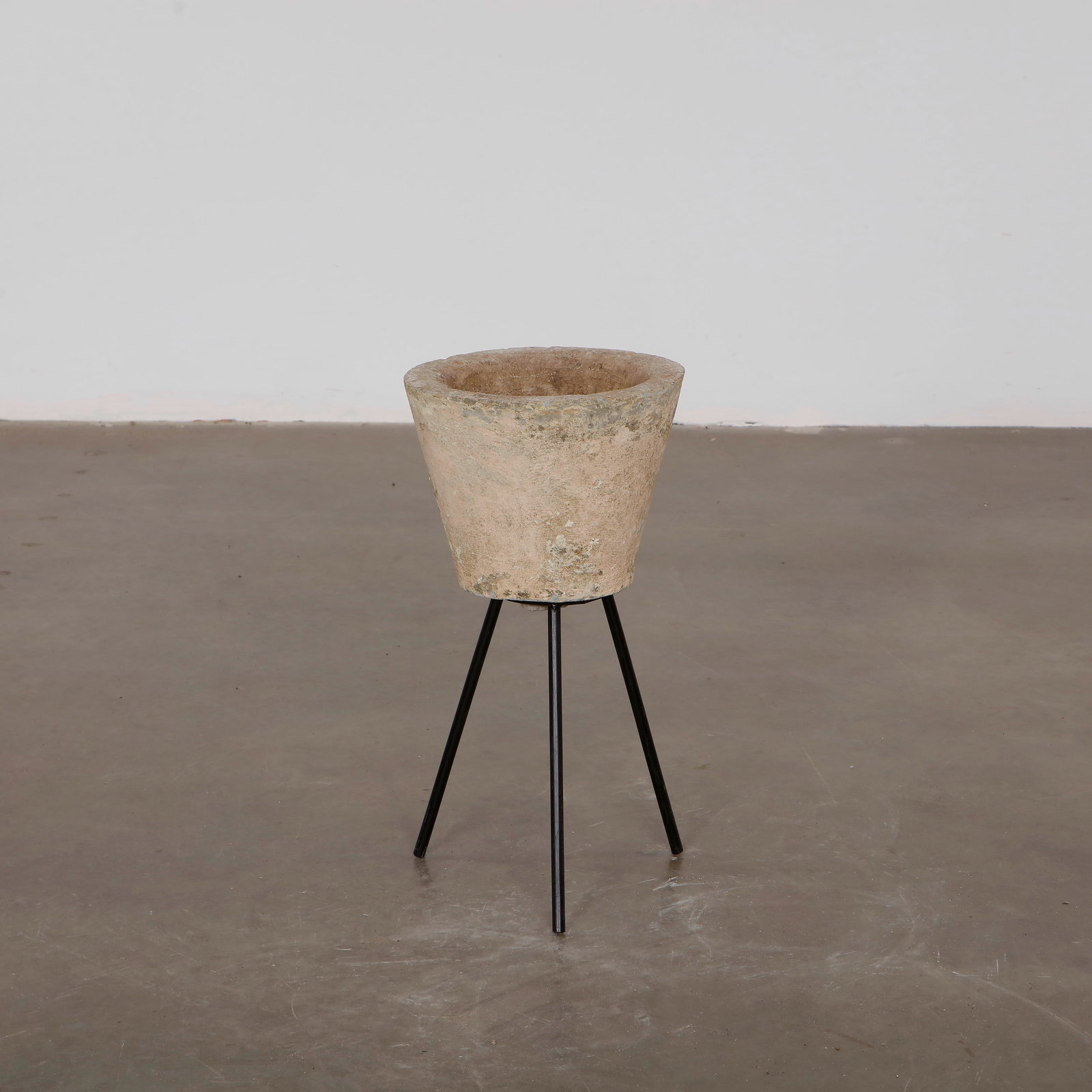 Small Limestone Planter with Stand, 1960s: Elegant small stone planter resting on a black iron stand. A refined expression of classic French elegance at its peak. Diameter: 10.5 in. Height: 20 in. - with stand - Height: 9 in. - without stand -