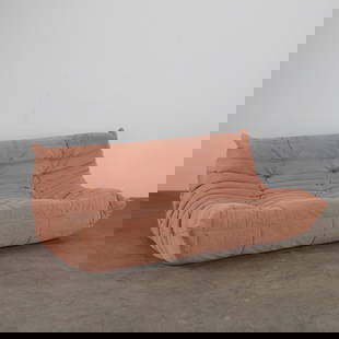 Michel Ducaroy, Pink Three-Seater Togo for Ligne Roset, 2000s: Iconic Togo sofa in blush pink fabric designed by Michel Ducaroy for Ligne Roset. France, 2000s. Height: 28 in. Width: 52 in. Depth: 40 in. Seat Height: 15 in.