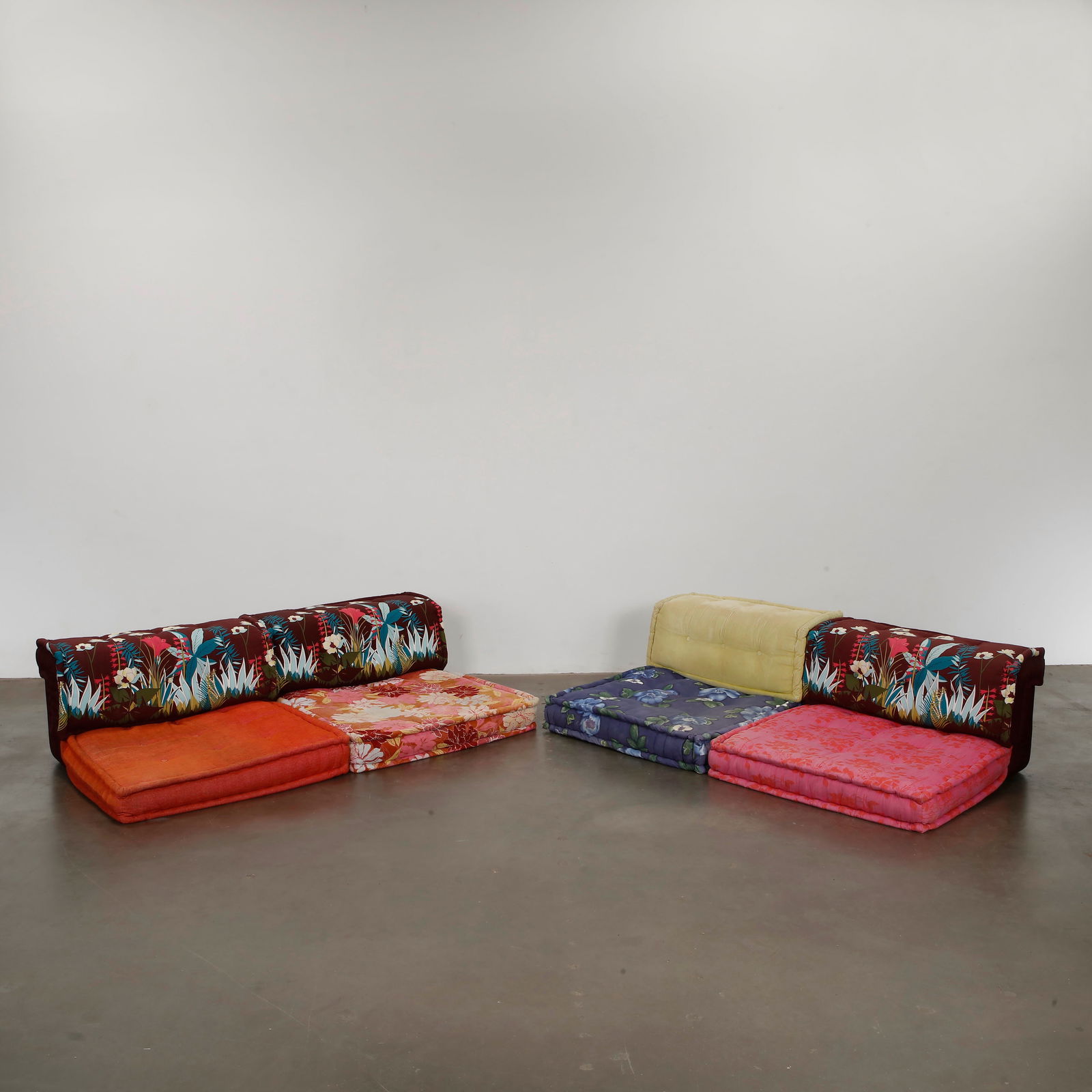 Roche Bobois, 8-Piece Mah Jong Sofa, 2000s: A rare 8-piece installation of the Mah Jong sofa system, highlighting Hopfer signature layering technique and exuberant textile palette. Floor Pillows: Height: 7 in. Width: 37.5 in. Depth: 37.5 in. Ba