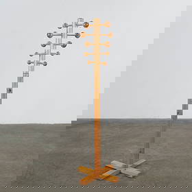 Charlotte Perriand, Coat Stand in Pine, 1960s: Standing coat stand in pine with rounded knobs, reflecting Perriand humanist approach to modern design. A piece that balances function and simplicity with architectural rigor. Height: 68 in. Diameter: