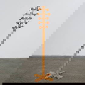 Charlotte Perriand, Coat Stand in Pine, 1960s: Standing coat stand in pine with rounded knobs, reflecting Perriand humanist approach to modern design. A piece that balances function and simplicity with architectural rigor. Height: 68 in. Diameter: