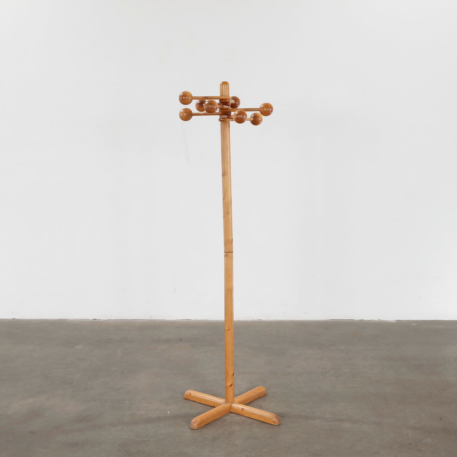 Charlotte Perriand, Coat Rack, 1960s: Solid wood standing coat rack with round pegs. Clean, modernist lines. Height: 64 in. Length: 23.5 in Width: 23.5 in.