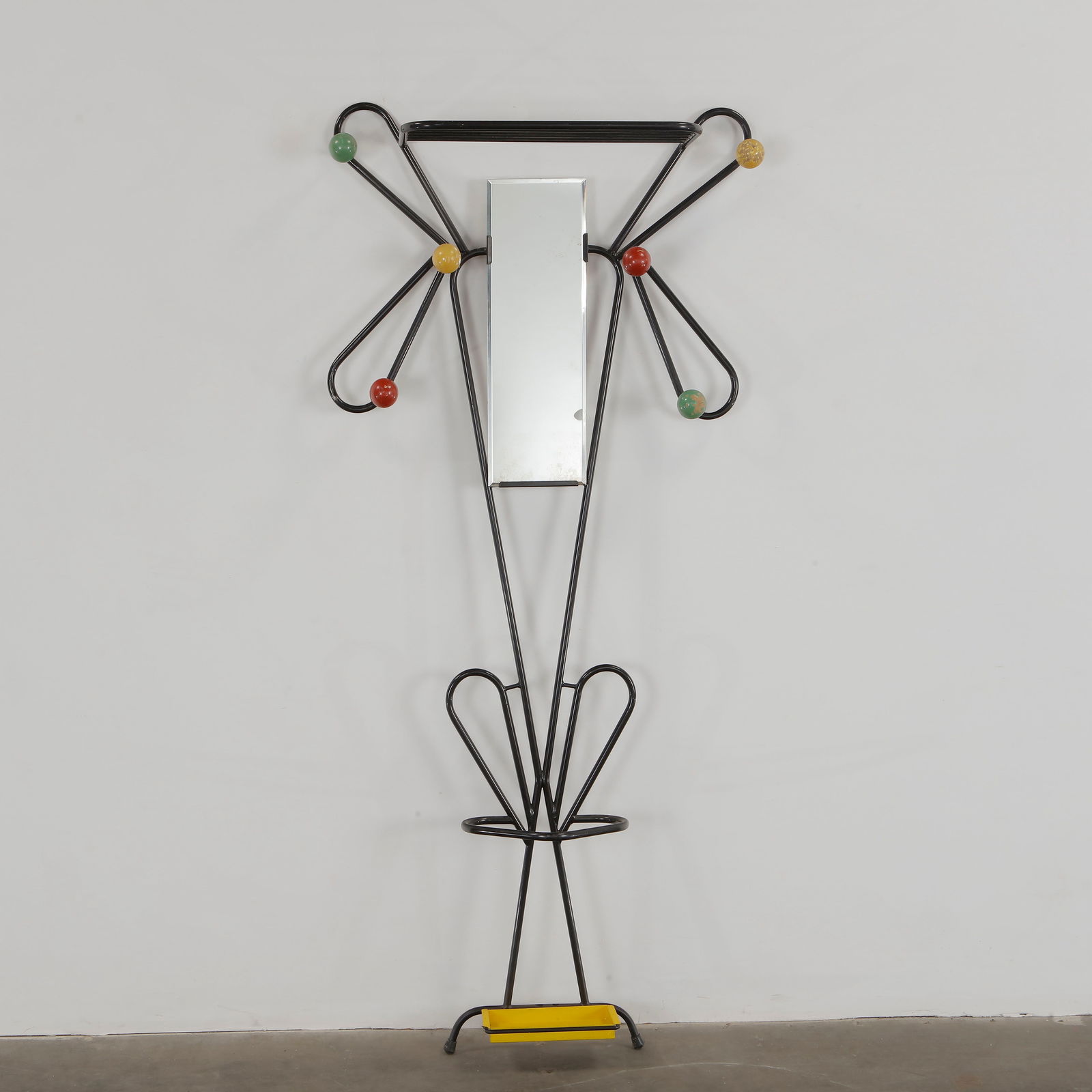 Roger Feraud, Atomic Hall Stand, 1960s: Tall metal hall stand with colorful round hooks and built-in mirror. Atomic style. Height: 74 in. Width: 33 in. Depth: 10 in.