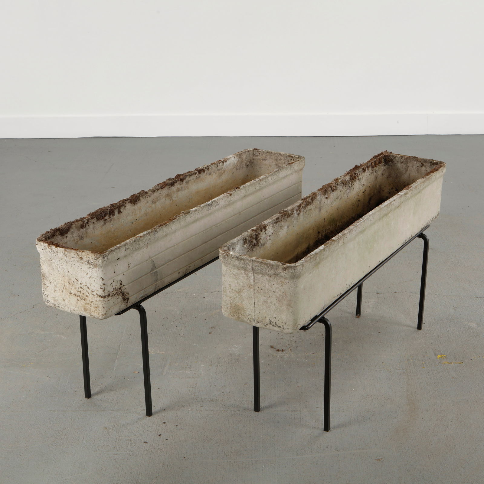 Willy Guhl, Pair of Rectangular Planters on Stands, 1960s: Classic rectangular Eternit planters designed by Willy Guhl. Timeless Swiss design with natural patina from outdoor use. Height: 19.5 in. Length: 39 in. Width: 8.5 in.