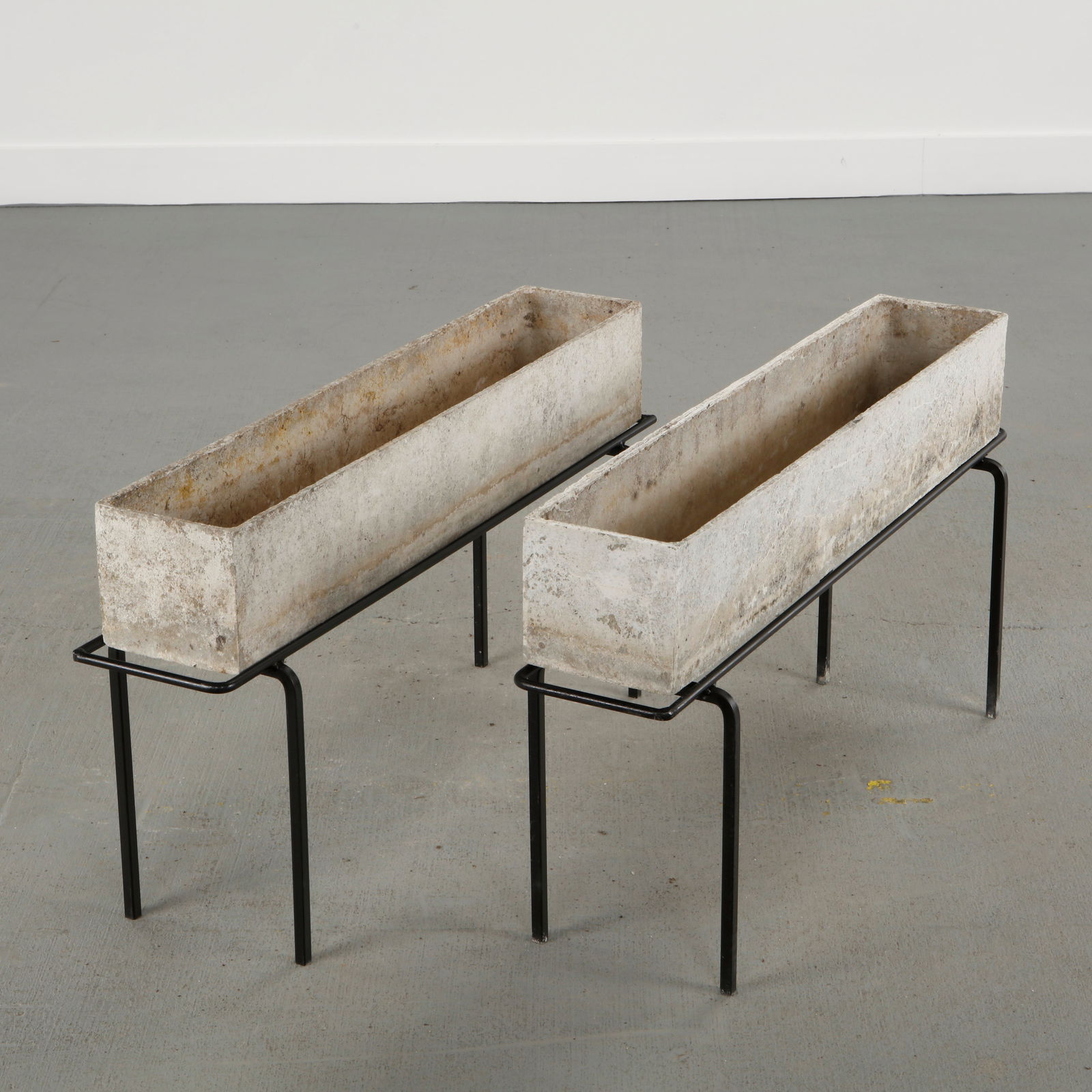 Willy Guhl, Pair of Rectangular Planters on Stands, 1960s: Classic rectangular Eternit planters designed by Willy Guhl. Timeless Swiss design with natural patina from outdoor use. Height: 18 in. Length: 31.5 in. Width: 6 in.