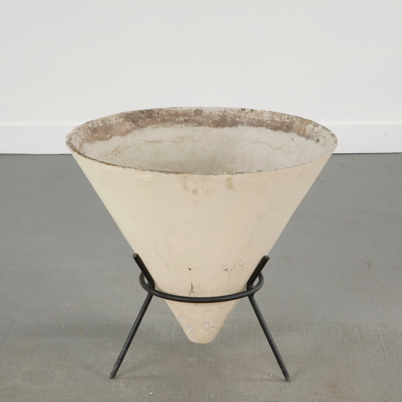 Willy Guhl, Conical Planter on Stand, 1960s: Iconic Willy Guhl silhouettes in compact form, this conical planter rest atop minimalistic metal stand, weathered yet timeless. Height: 21 in. Diameter: 23.5 in.