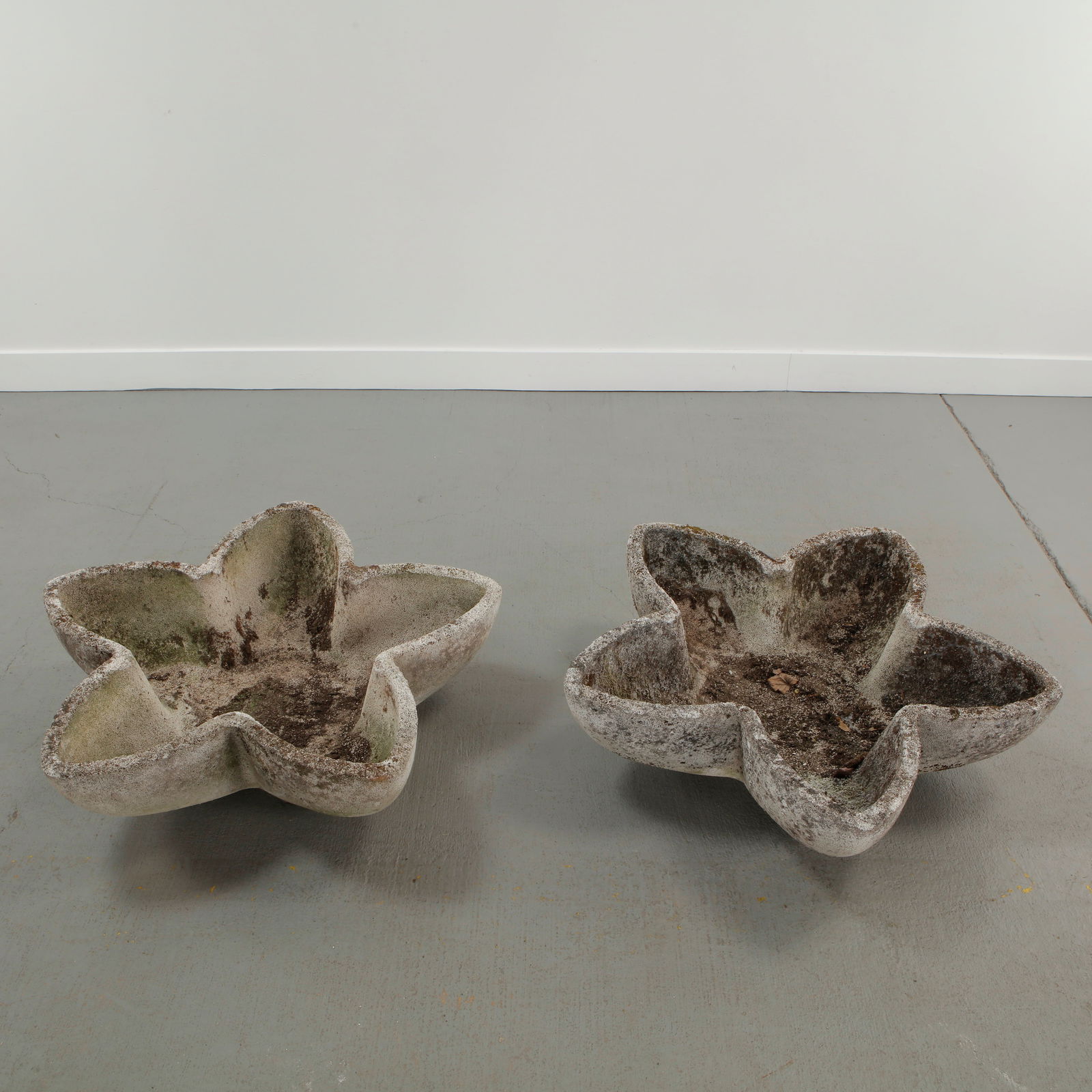 Grandon Fres, Large Cast Stone Star Planters, 1960s: Large cast stone planters with bold star-shaped profiles, offering a strong sculptural presence and richly weathered patina. Height: 8.5 in. Length: 31 in. Width: 25 in.