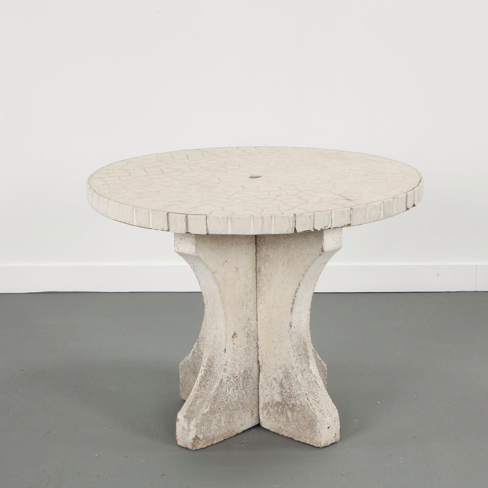 Mosaic Outdoor Dining Table, 1960s: Circular outdoor dining table with mosaic tiled top set on a sculptural concrete pedestal. The irregular tesserae create a rare composition. A functional yet decorative centerpiece for exterior