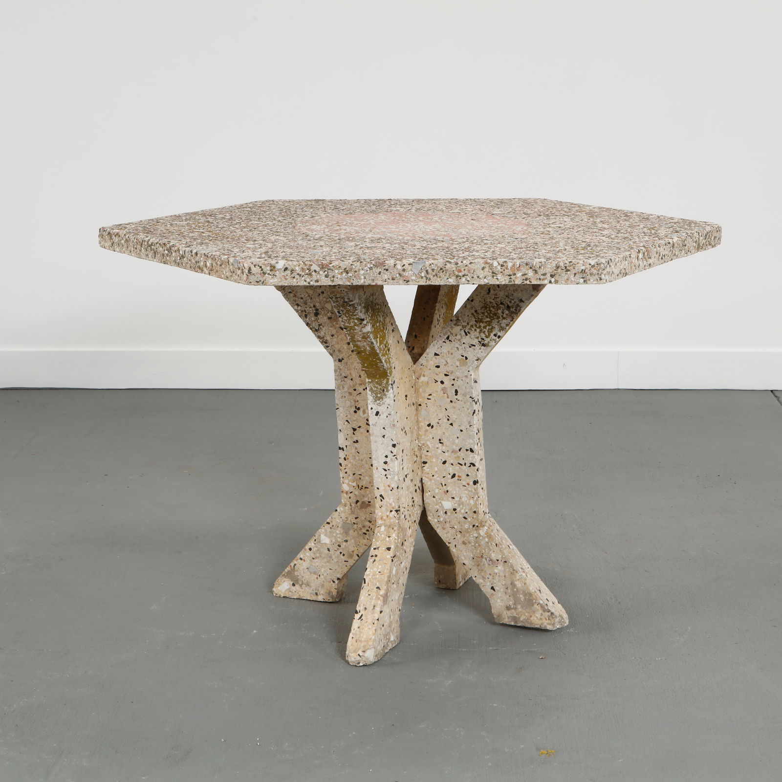 Outdoor Terrazzo Dining Table, 1960s: Pedestal dining table executed in terrazzo with a thick circular top. Designed for outdoor use with strong architectural form and enduring materiality. Height: 30 in. Length: 46.5 in. Width: 40 in.