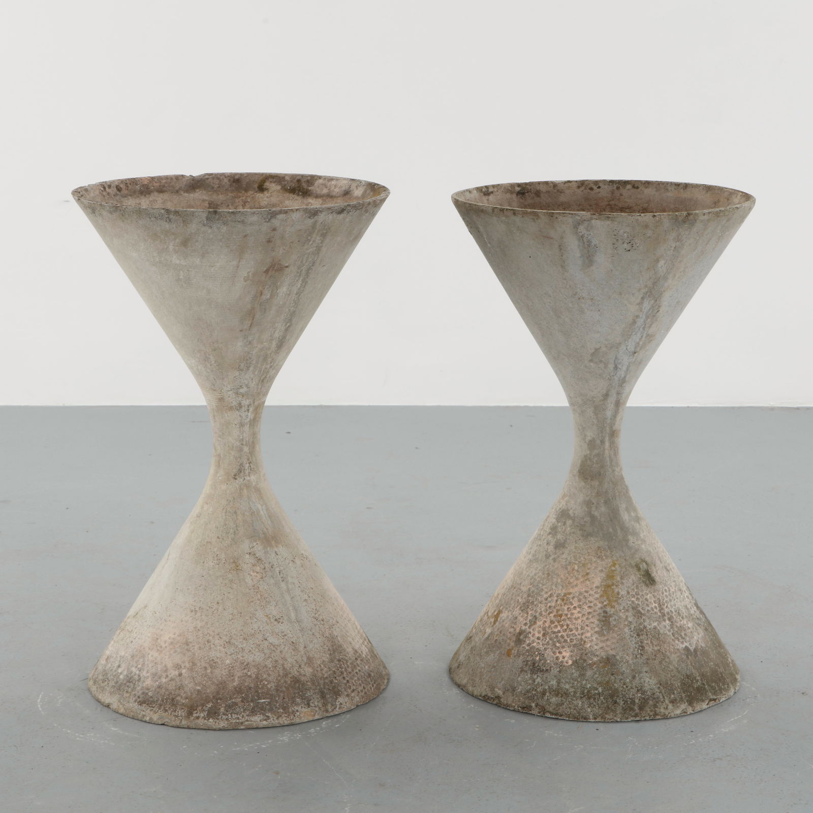 Willy Guhl, Pair of Large Diabolo Planters, 1960s: Pair of Willy Guhl large diabolo planters manufactured by Eternit, Switzerland. Height: 36 in. Width: 22 in.