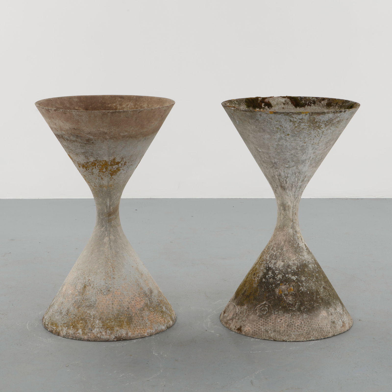 Willy Guhl, Pair of Large Diabolo Planters, 1960s: Pair of Willy Guhl large diabolo planters manufactured by Eternit, Switzerland. Height: 36 in. Width: 22 in.