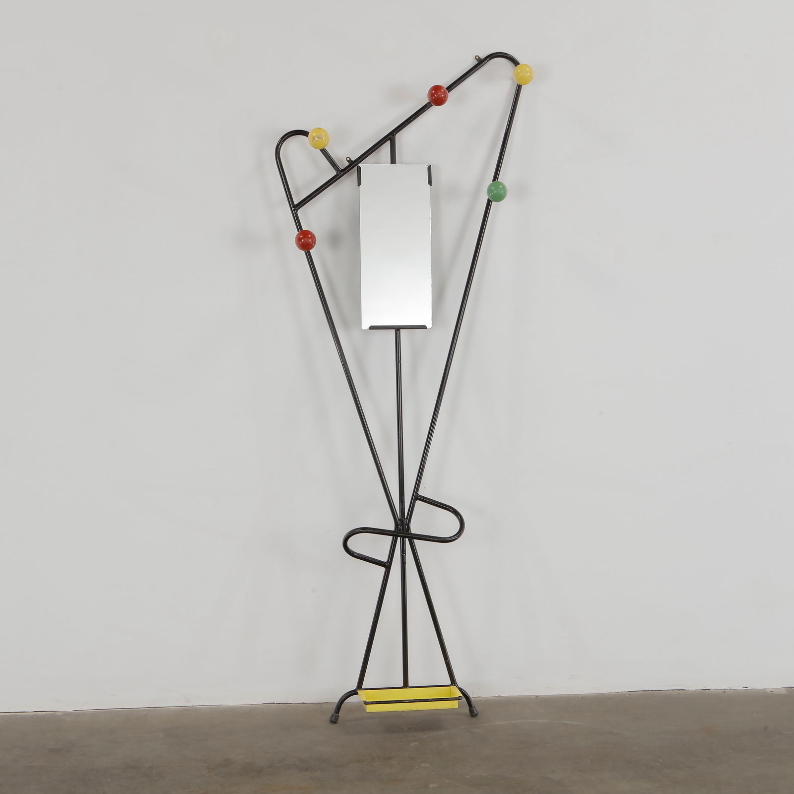 Roger Feraud, Hall Stand, 1950s: Iconic mid-century hall stand in lacquered metal with colorful spherical hooks. A playful sculptural piece that combines utility with graphic impact. Height: 71 in. Length: 23 in. Width: 5 in.