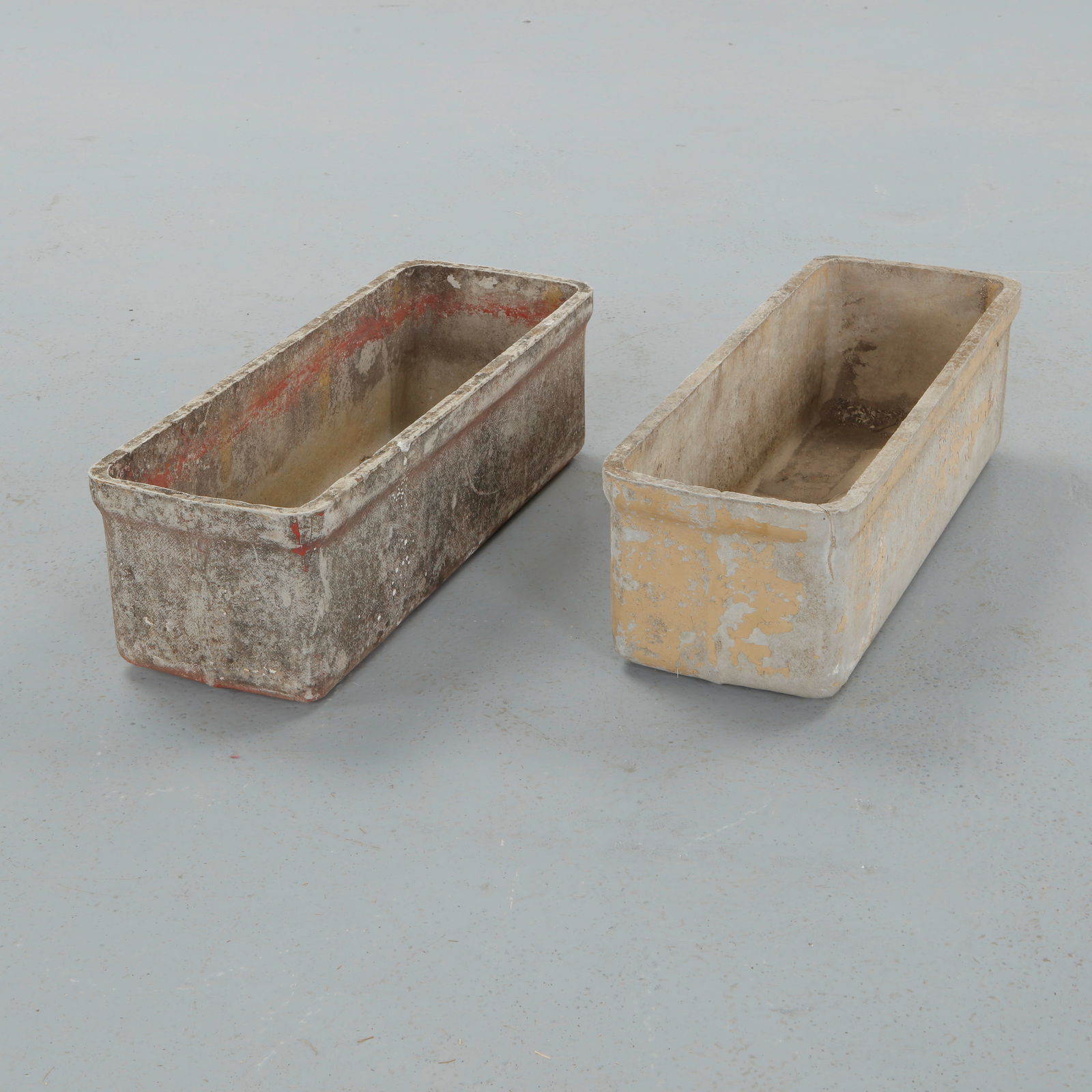 Willy Ghul, Pair of Rectangular Planters, 1960s: Set of classic rectangular Eternit planters designed by Willy Guhl. Timeless Swiss design with natural patina from outdoor use. Height: 7 in. Width: 23.5 in. Depth: 8.5 in.