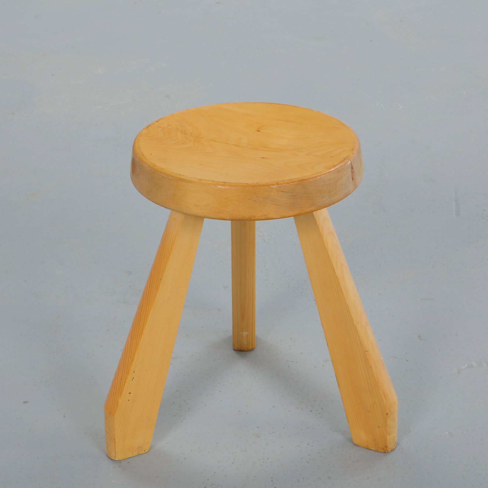 Charlotte Perriand for Les Arcs 1600, Sandoz Stool, 1960s: Executed in solid pine with a circular seat resting on three splayed legs, this stool reflects the alpine modernist language developed for Les Arcs. The restrained construction and natural patina emph