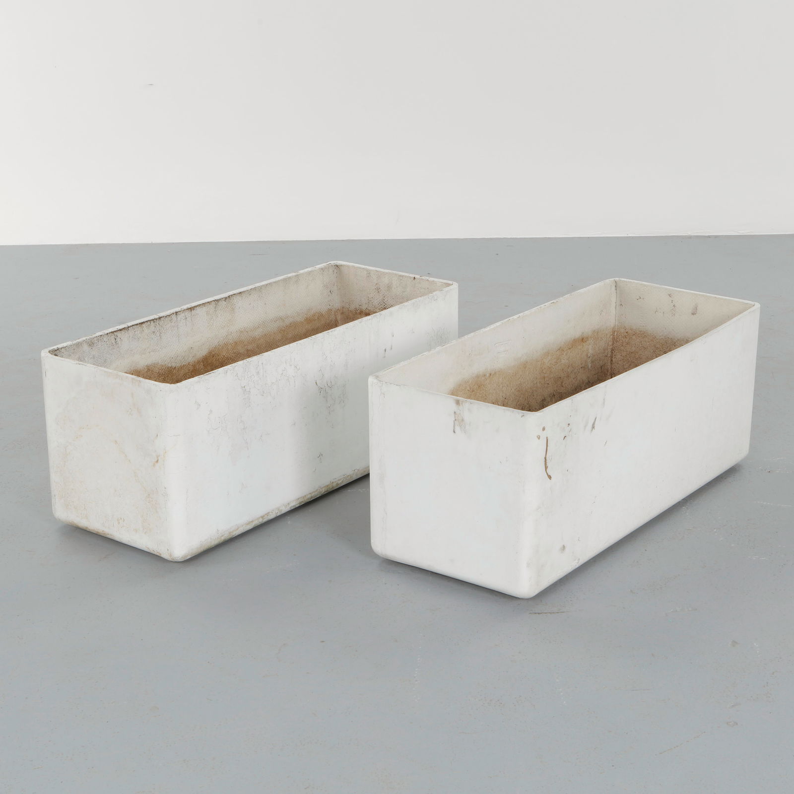 Willy Guhl, Pair of Large Rectangular Planters, 1960s: Classic rectangular Eternit planters designed by Willy Guhl. Timeless Swiss design with natural patina from outdoor use. Height: 16 in. Width: 39.5 in. Depth: 16 in.