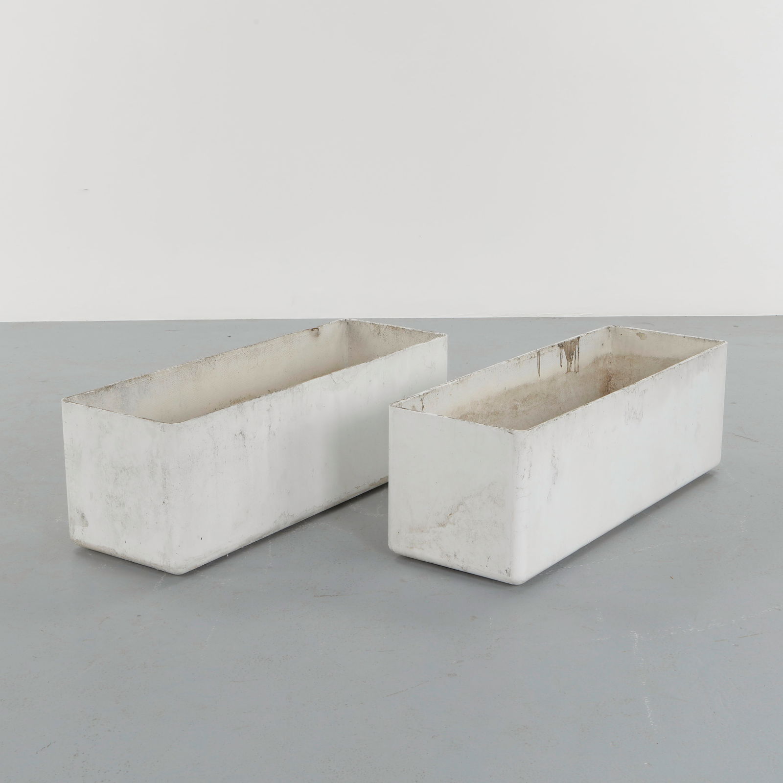 Willy Guhl, Pair of Large Rectangular Planters, 1960s: Classic rectangular Eternit planters designed by Willy Guhl. Timeless Swiss design with natural patina from outdoor use. Height: 16 in. Width: 47.5 in. Depth: 16 in.