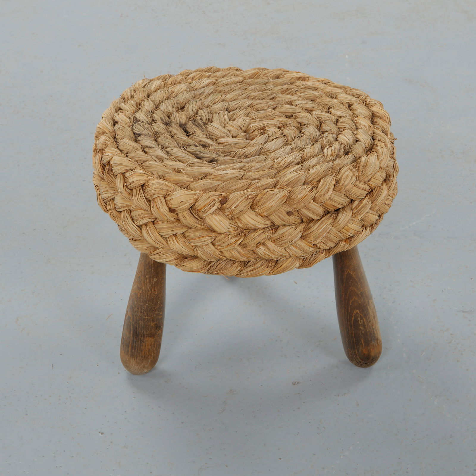 Audoux Minet, Small Rope Stool, 1960s: Crafted in solid wood with a tightly braided rope seat, this small stool exemplifies the rustic refinement associated with Audoux Minet. The compact proportions and organic materiality reflect the