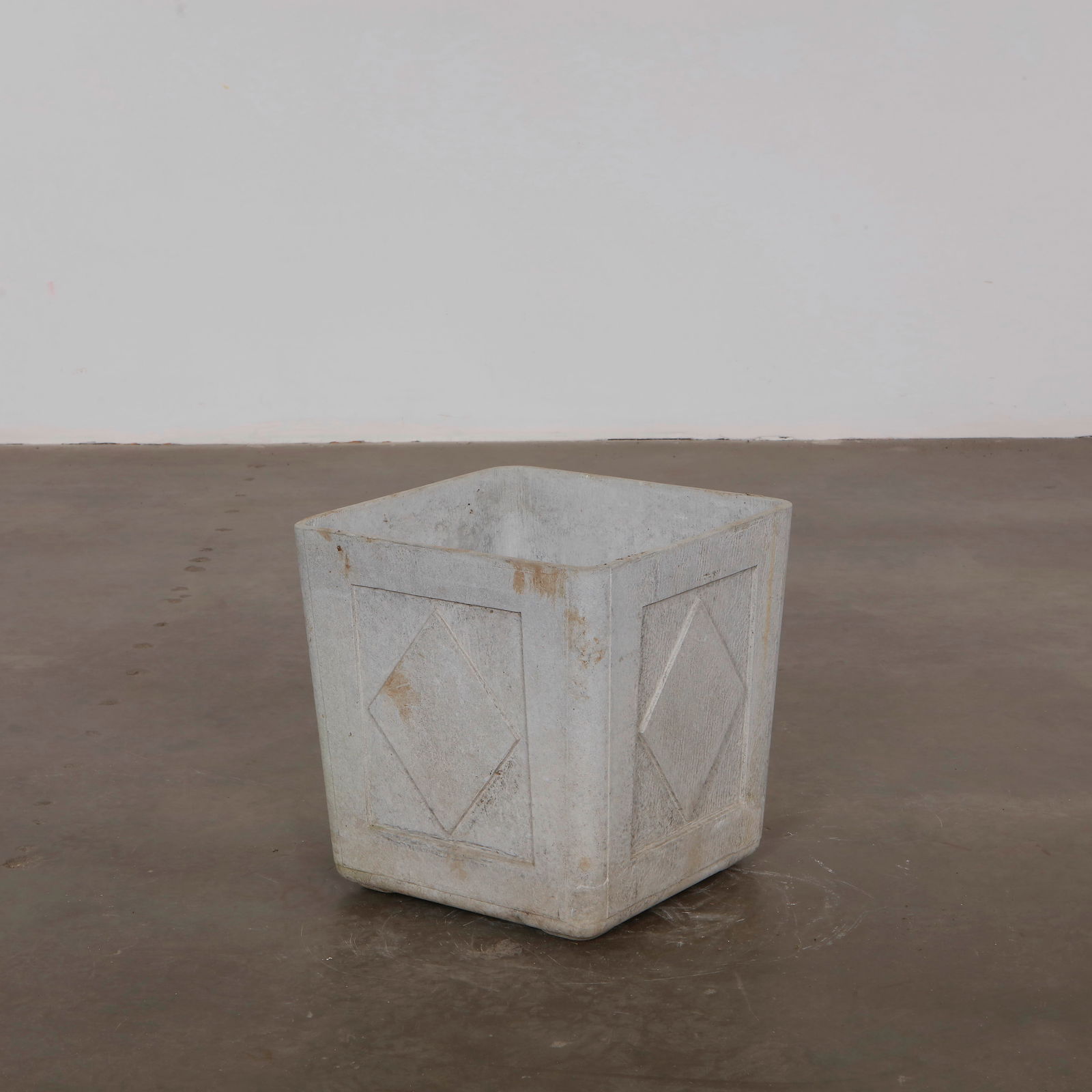 Square Willy Guhl Diamond Pattern Planter, 1960s: A square Eternit planter by Willy Guhl, 1960s. Embellished with raised diamond motifs and exhibiting a refined patina. Width: 15.75 in. Length: 15.75 in. Height: 16 in.