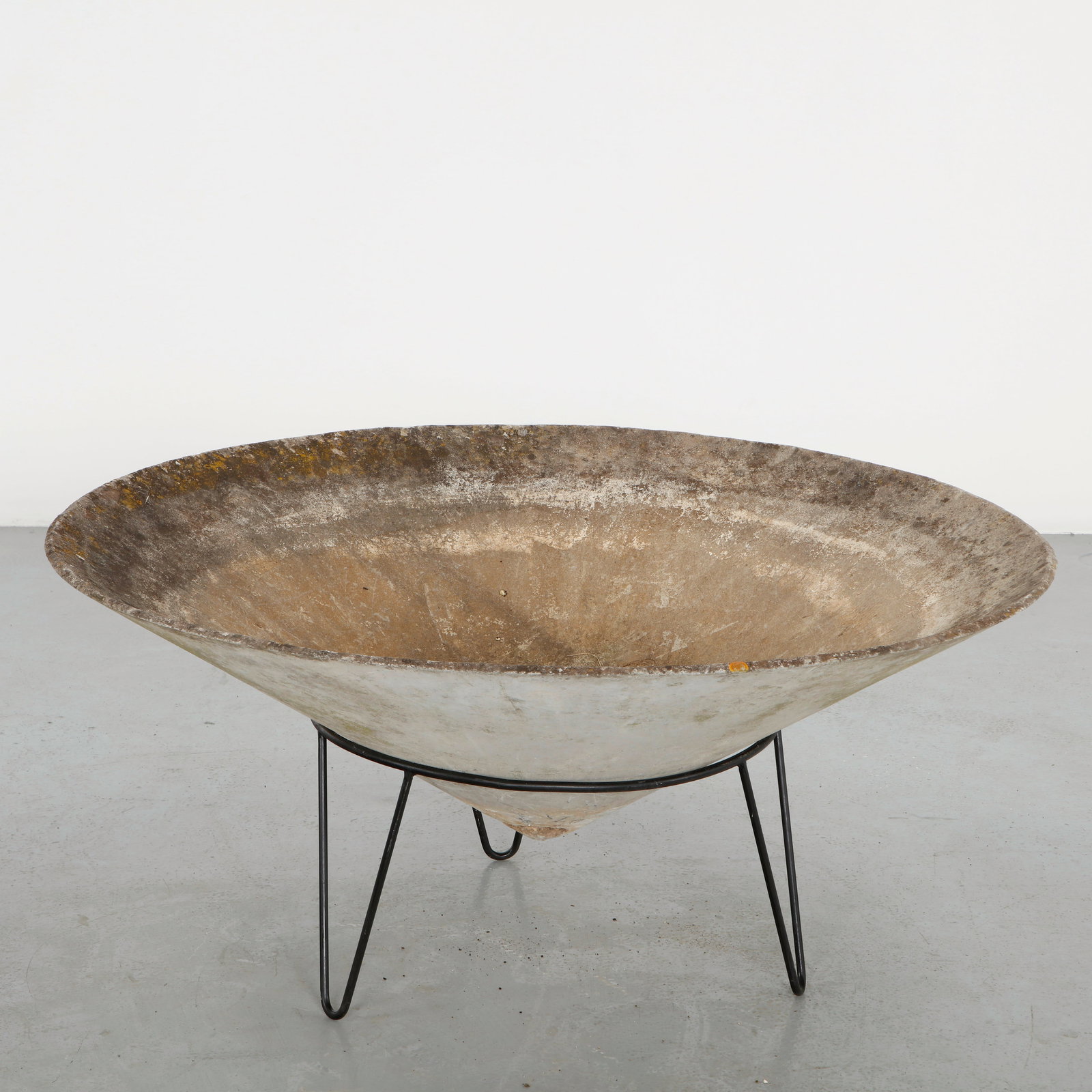 Willy Guhl, Large Conical Concrete Planter on Stand, 1960s: Designed by Willy Guhl, this large conical planter is executed in fiber cement and supported by a slender metal stand. The dramatic silhouette and weathered patina exemplify the sculptural purity and