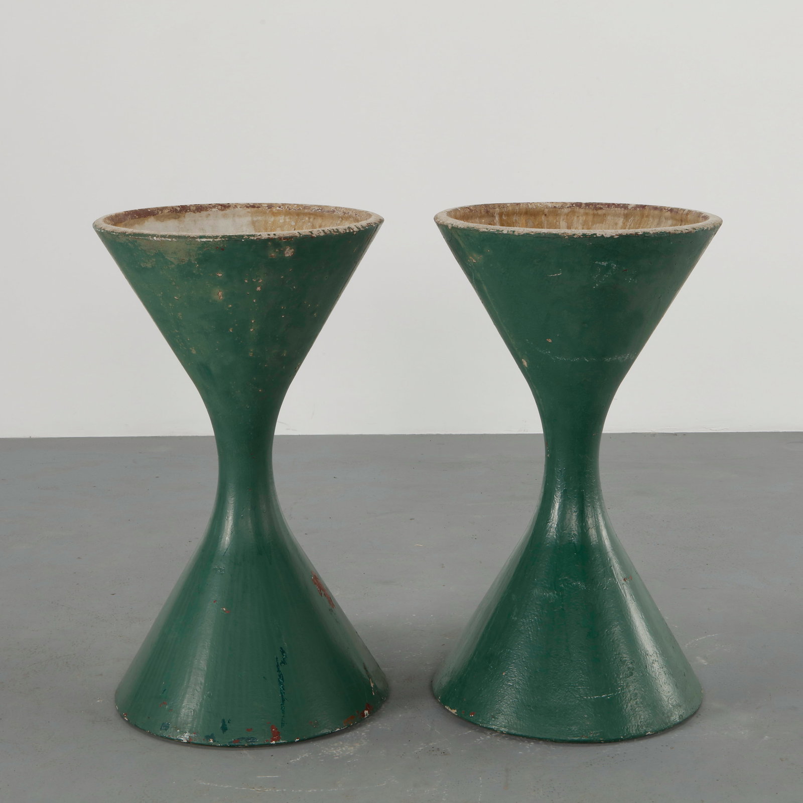 Willy Guhl, Pair of Large Diabolo Planters, 1960s: Pair of Willy Guhl large diabolo planters manufactured by Eternit, Switzerland. Height: 36 in. Diameter: 22 in.