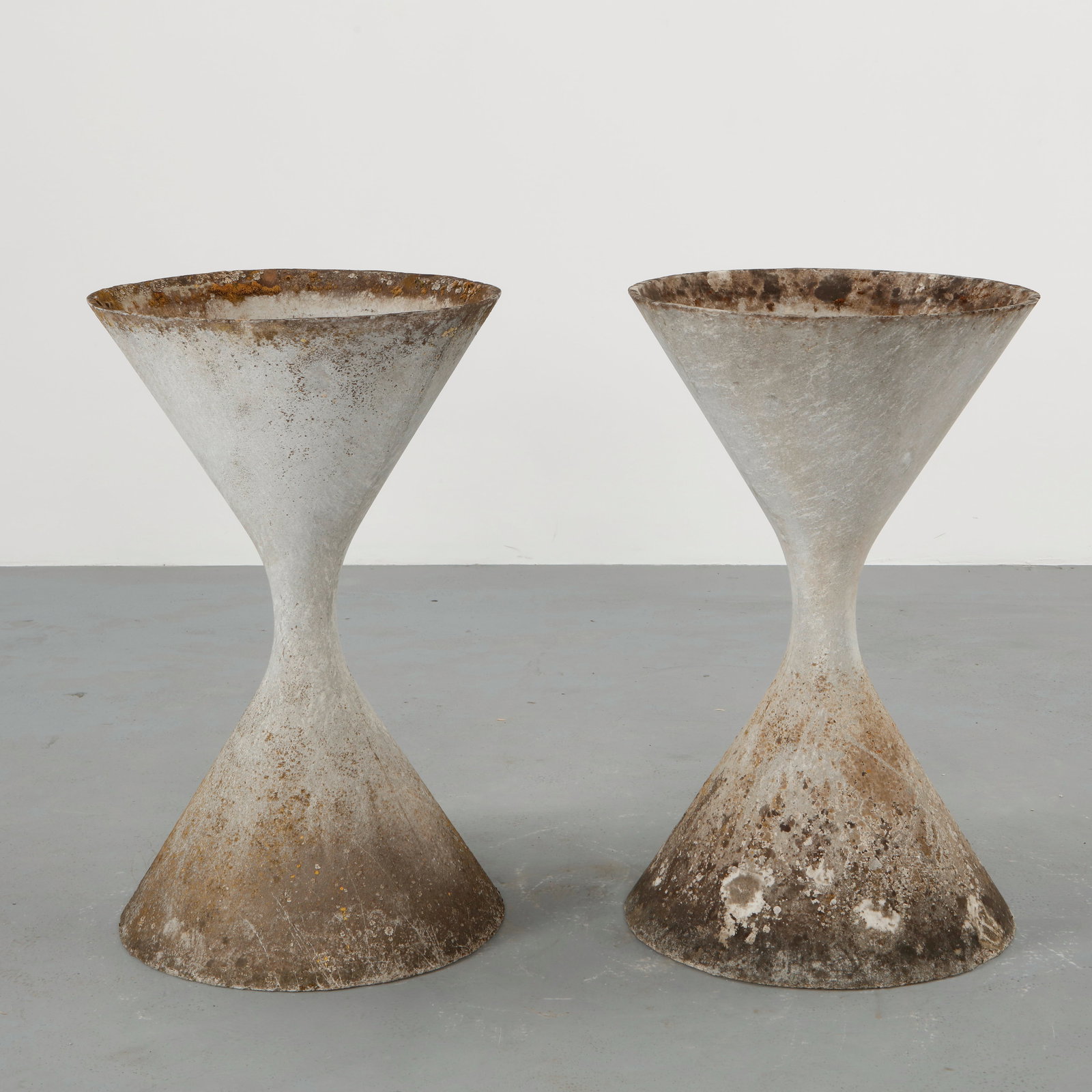 Willy Guhl, Pair of Large Diabolo Planters, 1960s: Willy Guhl large diabolo planter manufactured by Eternit, Switzerland. Height: 36 in. Diameter: 22 in.