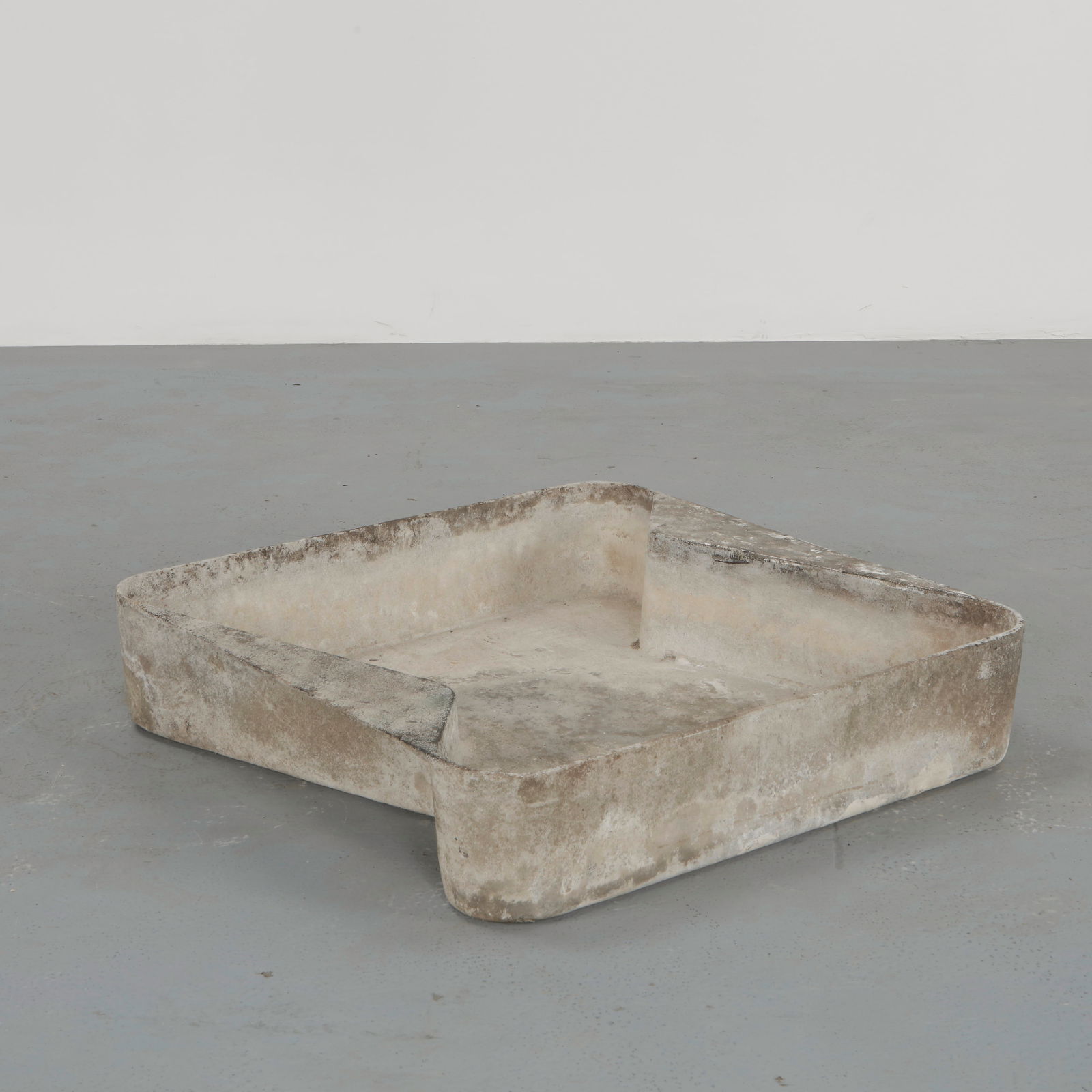 Willy Guhl, The Play Pit, 1960s: Hand-cast in cement with generous rounded bodies and tapered rims. Their weathered surfaces reveal decades of natural patina, enhancing the sculptural quietness of their silhouette. Height: 23 in. Dia