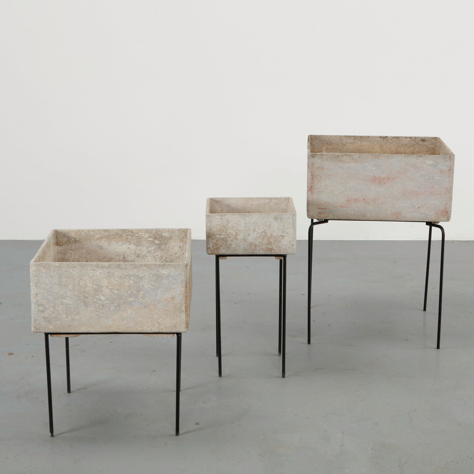 Willy Guhl, Trio of Square Planters on Stands, 1960s: Set of three square planters designed by Willy Guhl and produced by Eternit in fiber cement. The clean geometric forms and softly weathered surfaces reflect the designers mastery of minimalist outdoor