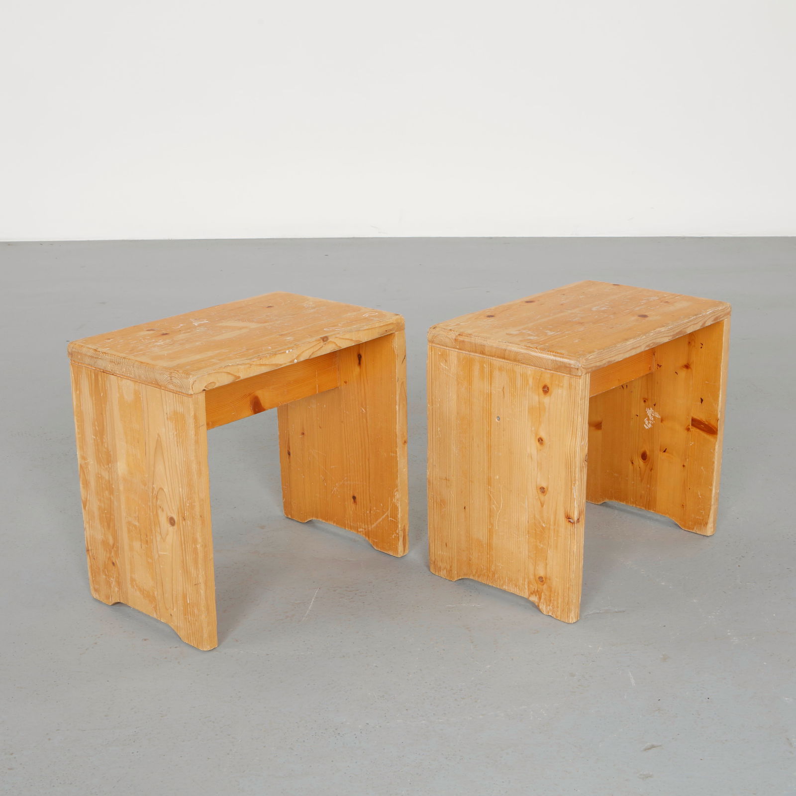 Charlotte Perriand for Les Arcs 1600, Pair of Stools, 1960s: Executed in solid pine with clean architectural lines characteristic of the Les Arcs resort interiors. The restrained construction and warm patina reflect Perriand functional approach to alpine furnit