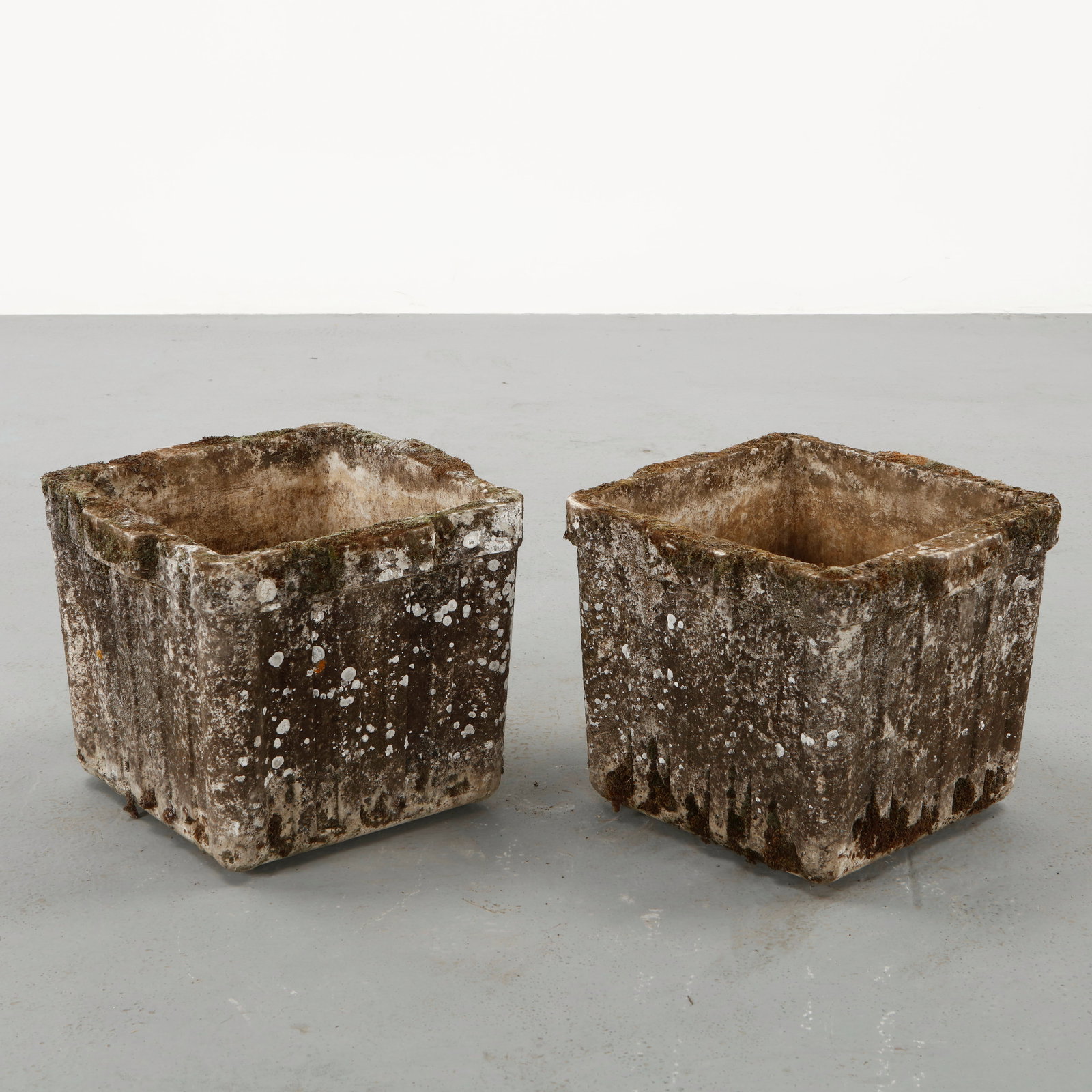 Willy Guhl, Pair of Square Planters, 1960s: Pair of square planters designed by Willy Guhl and produced by Eternit in molded fiber cement. The restrained geometry emphasizes the architectural clarity of the form while the naturally aged surface