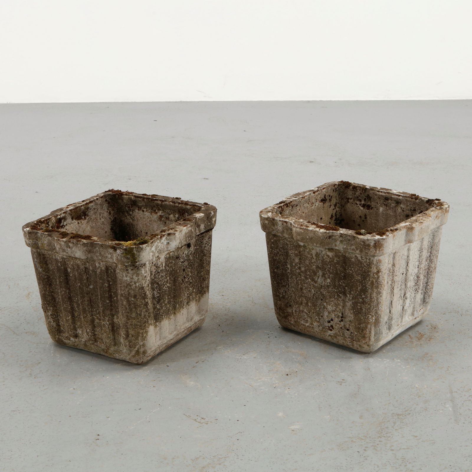 Willy Guhl, Pair of Square Planters, 1960s: Pair of square planters designed by Willy Guhl and produced by Eternit in molded fiber cement. The restrained geometry emphasizes the architectural clarity of the form while the naturally aged