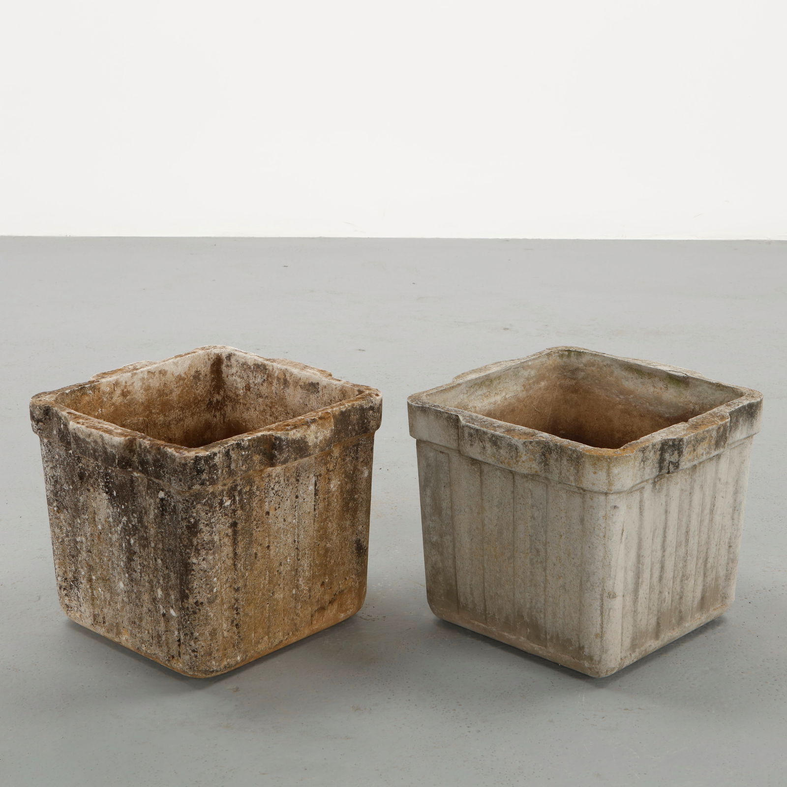 Willy Guhl, Pair of Square Planters, 1960s: Pair of square planters designed by Willy Guhl and produced by Eternit in molded fiber cement. The restrained geometry emphasizes the architectural clarity of the form while the naturally aged surface